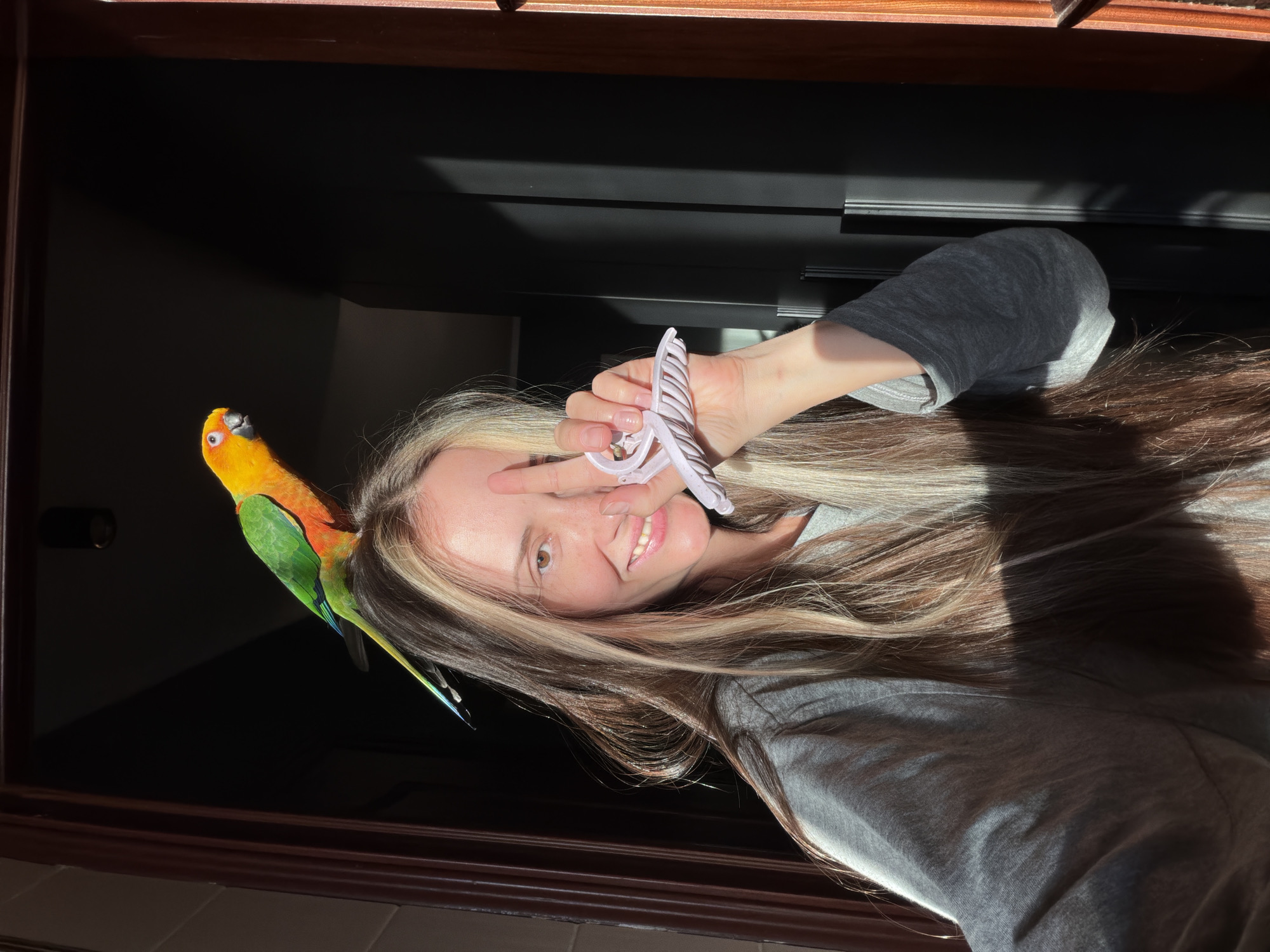 Woman documents playful moments with pet parrot in Khimki