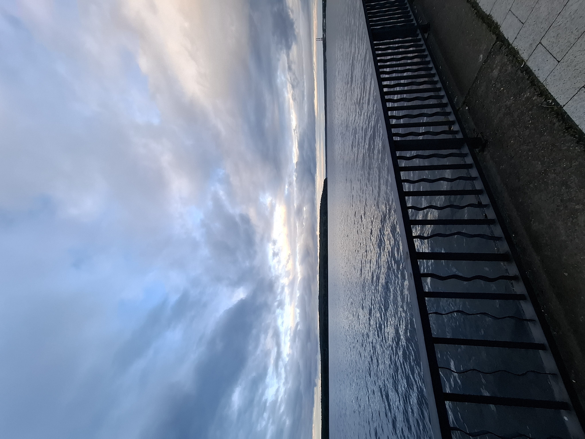 Evening family activities documented along Chaikovsky waterfront promenade