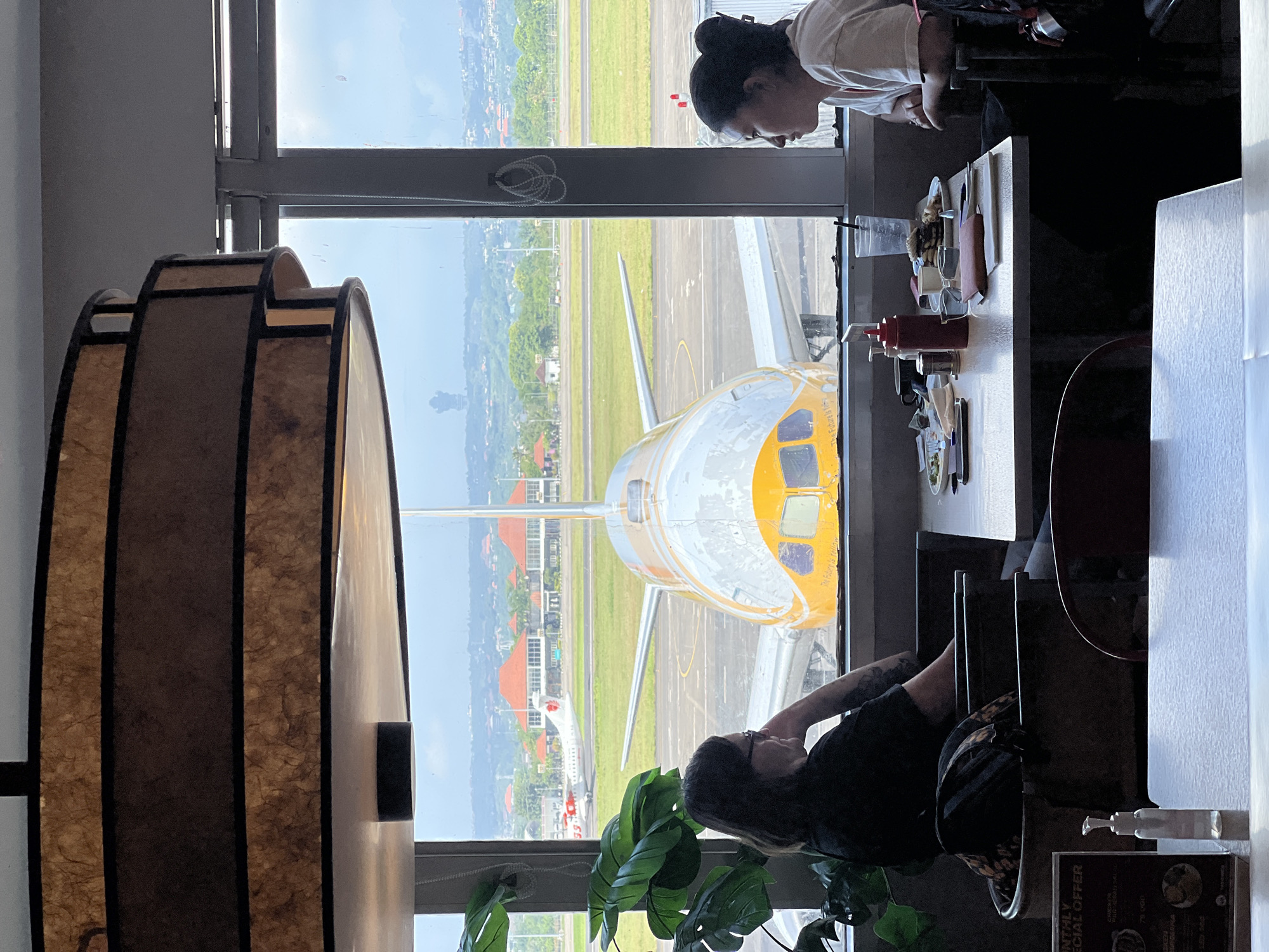 Traveler documents early morning airport experience in Kuta, Indonesia