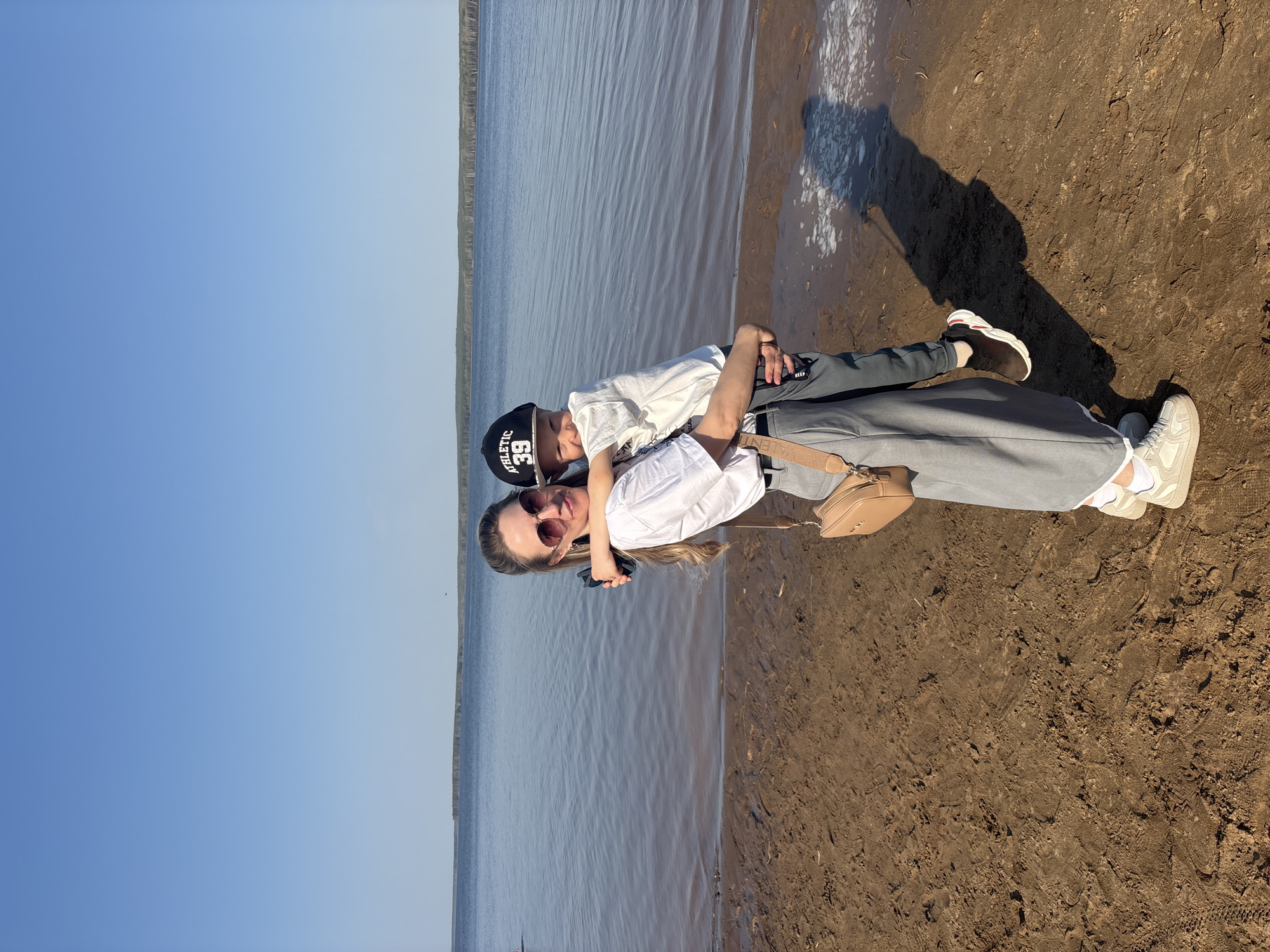 Families enjoy sunny afternoon at Chaikovsky beach along Kama River