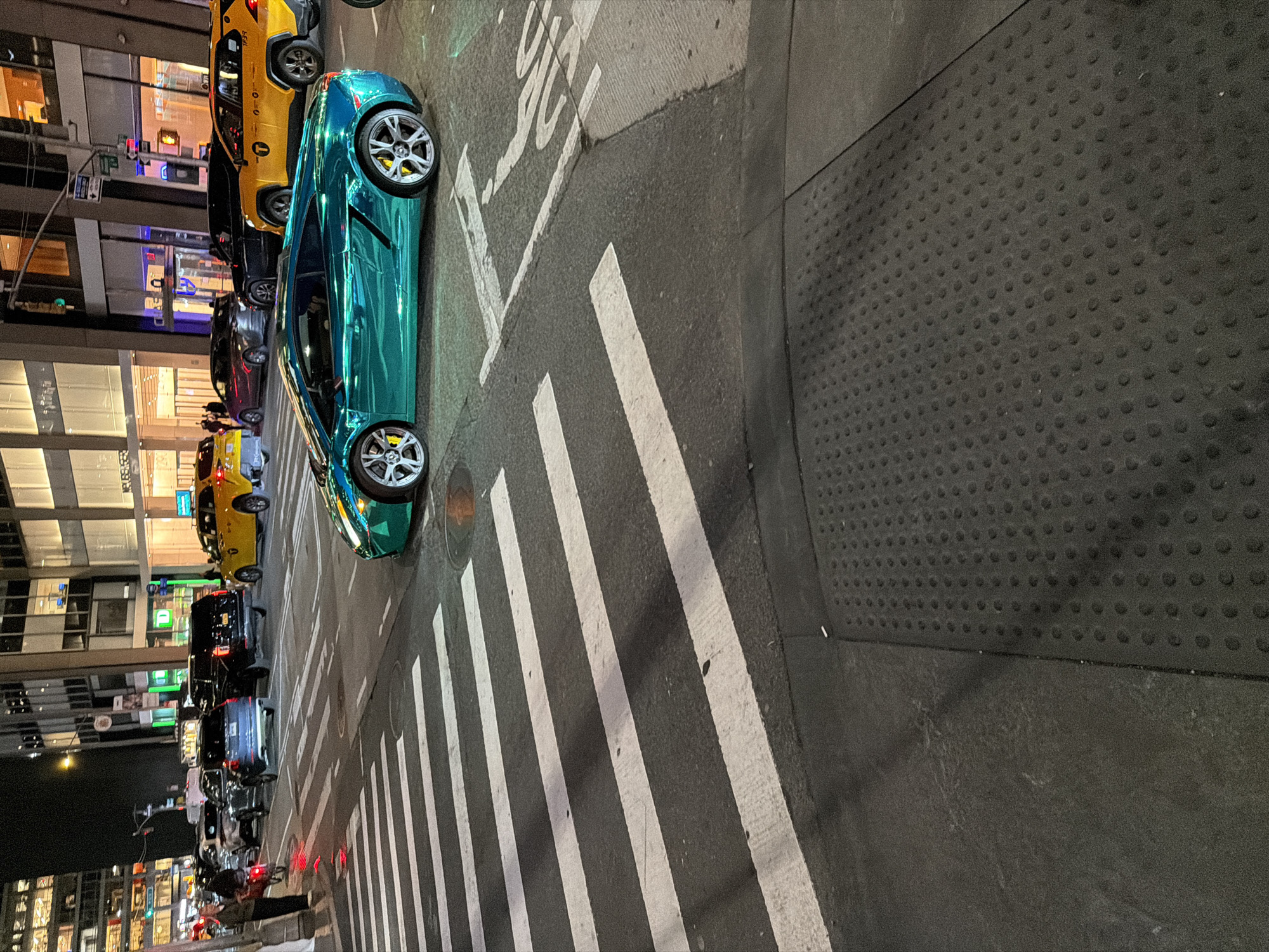 Turquoise Lamborghini spotted on Manhattan street at night