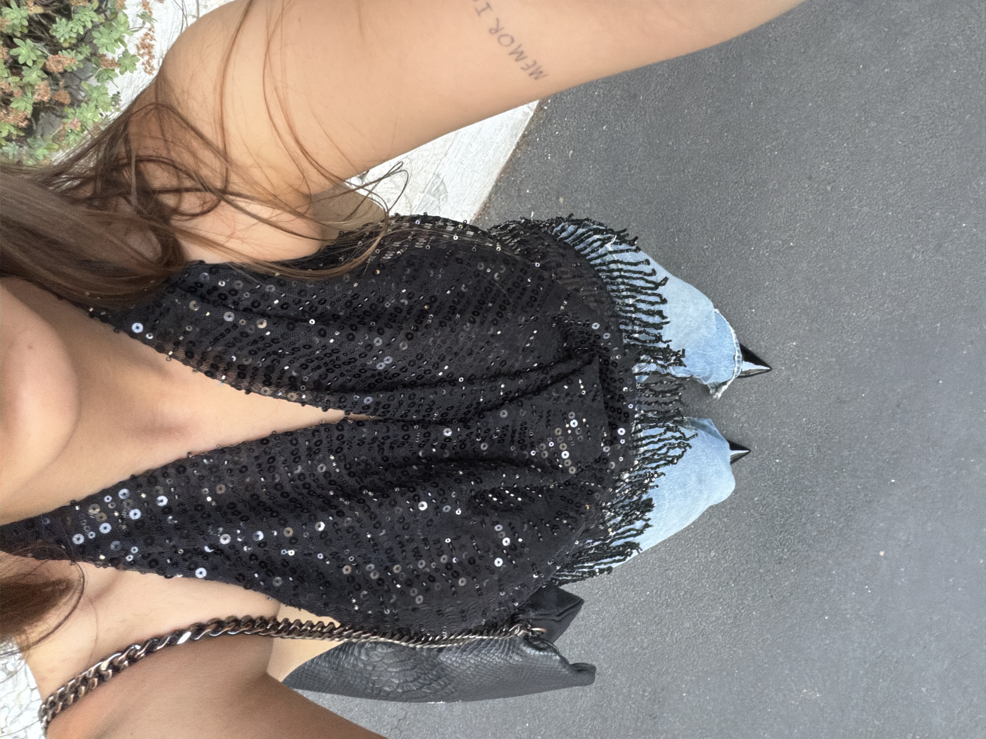 Person photographed in sequined outfit in Milan