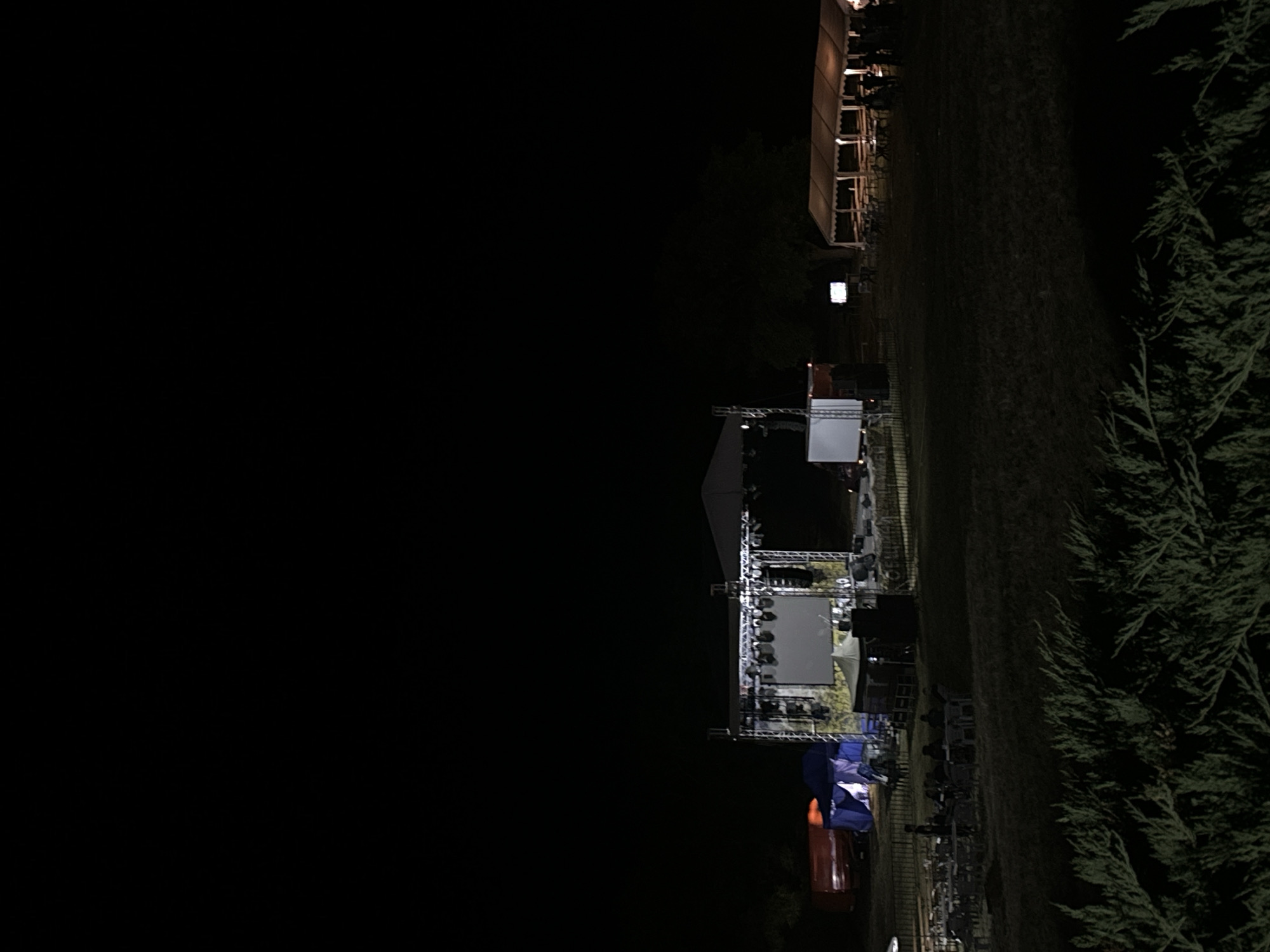 Outdoor stage and lighting rig set up for night event in Shumen