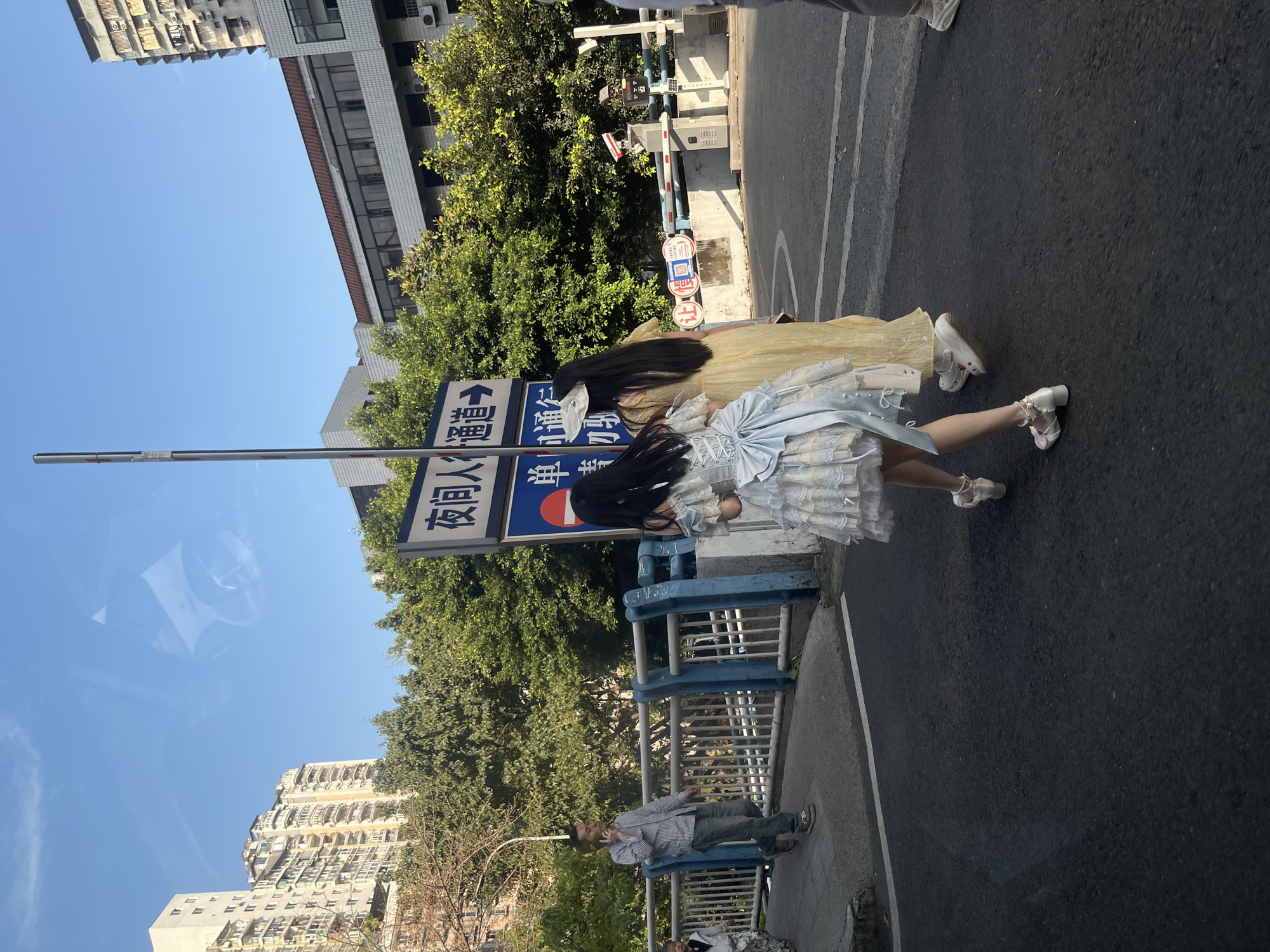 Pedestrians, costumed individuals observed near Chongqing hospital Thursday morning