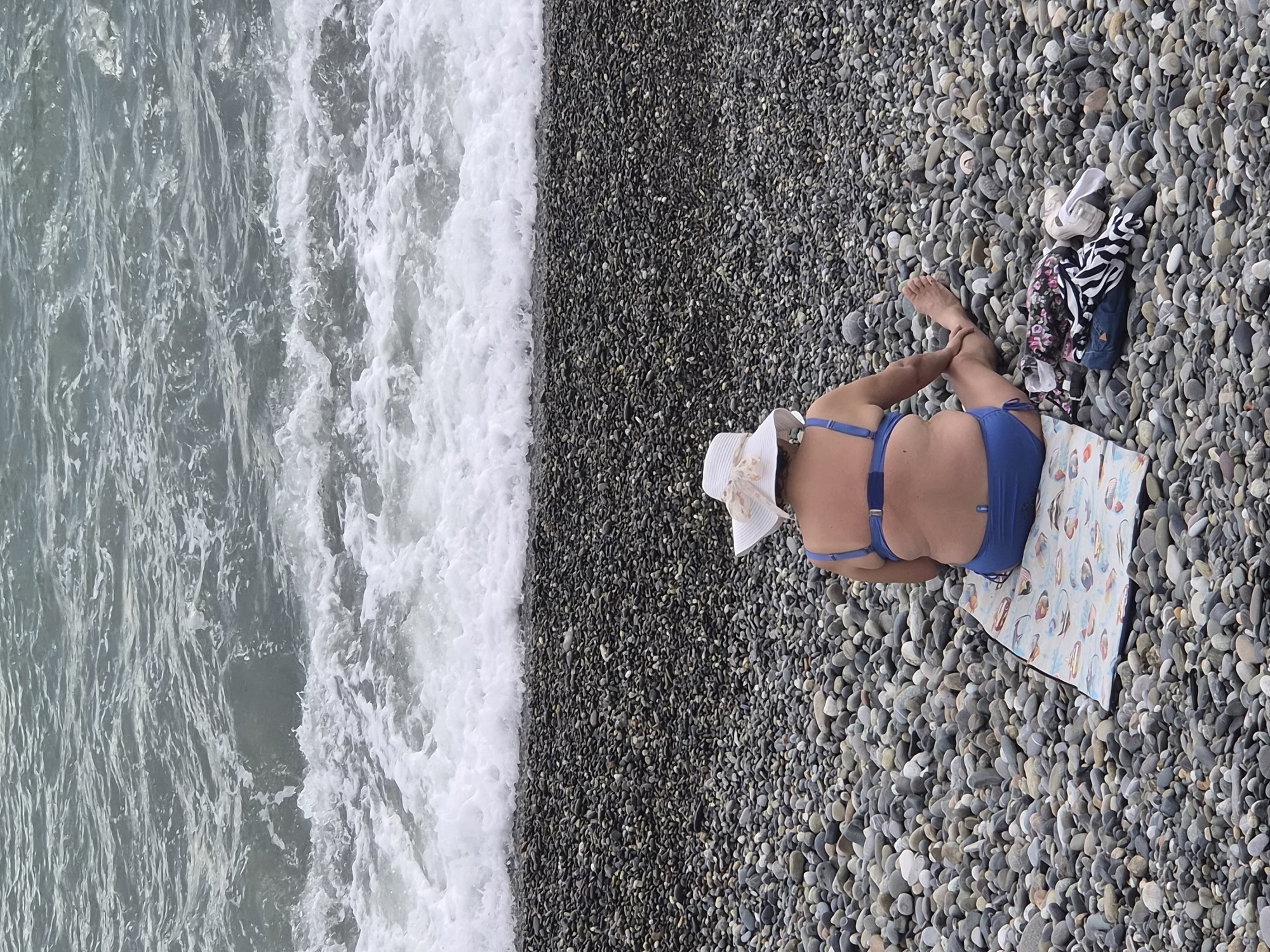 Beachgoers enjoy afternoon activities along Sochi's Black Sea coast