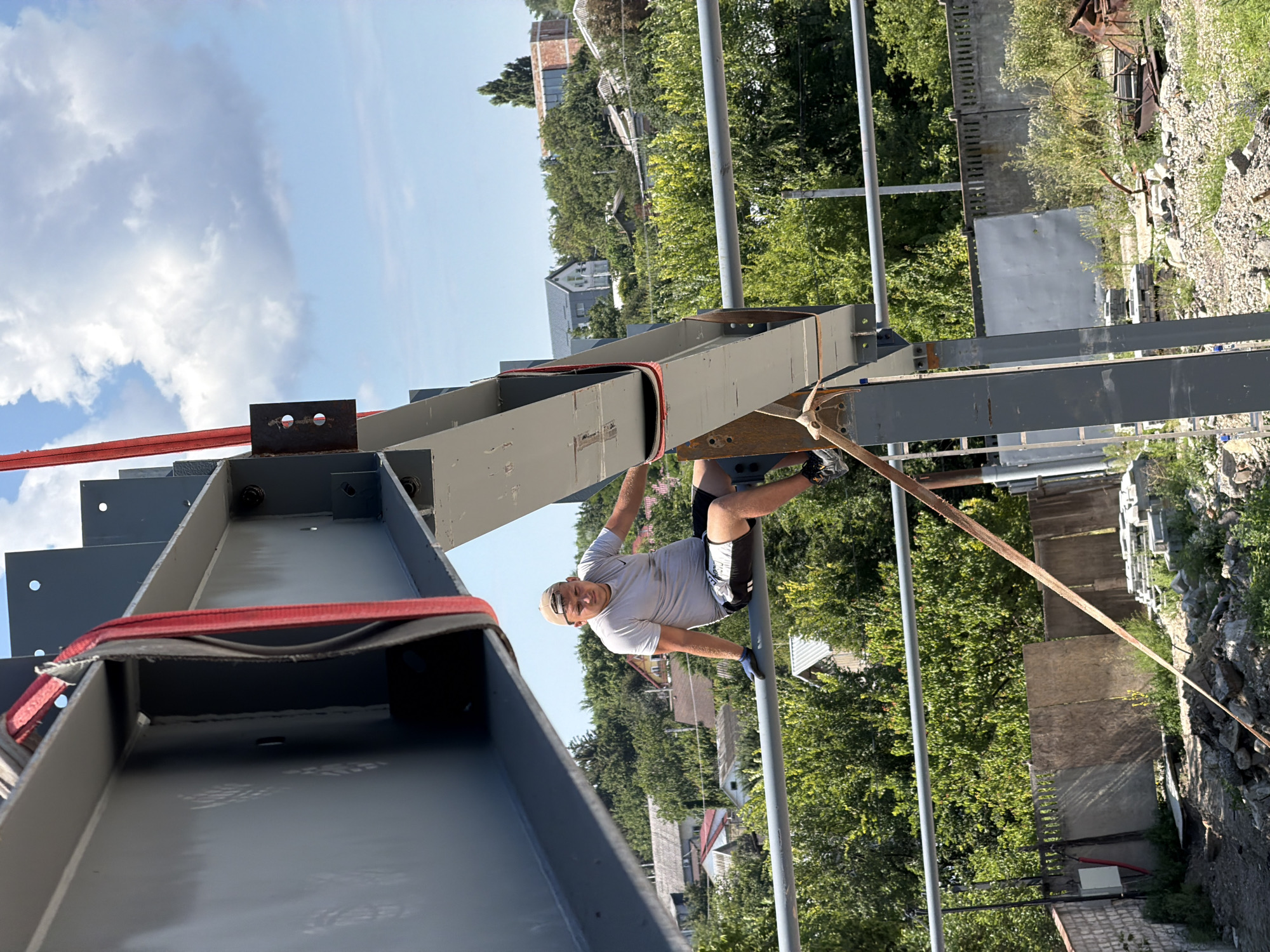 Steel beam installation underway at a Vatra, Moldova construction site