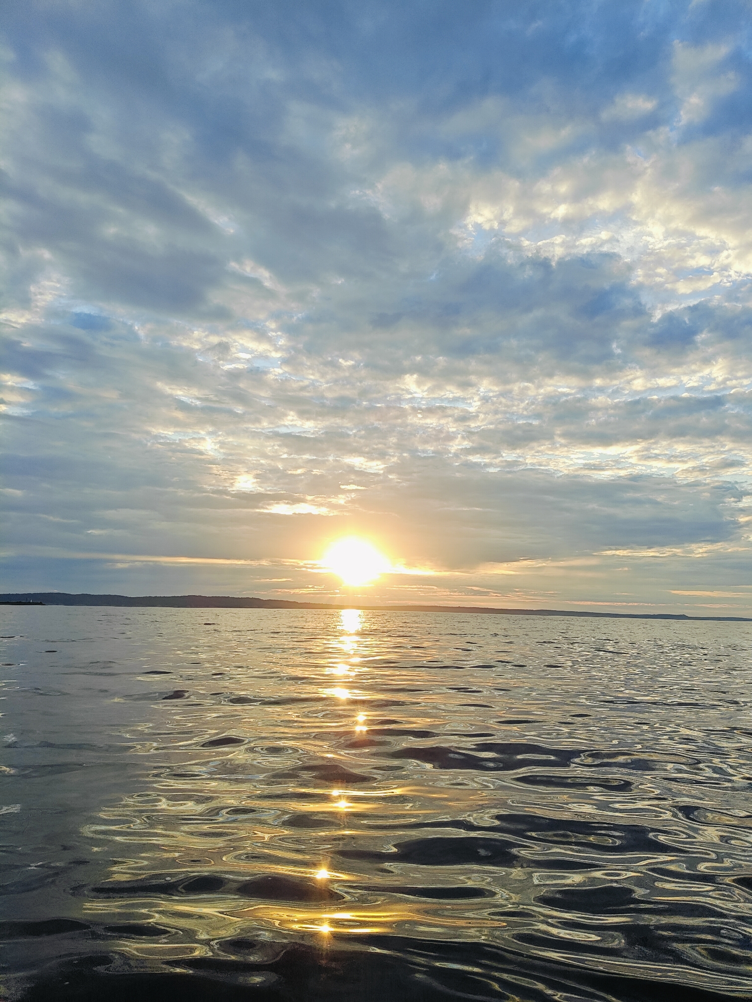 Evening fishing on the Kama River under a dramatic Chaykovsky sunset