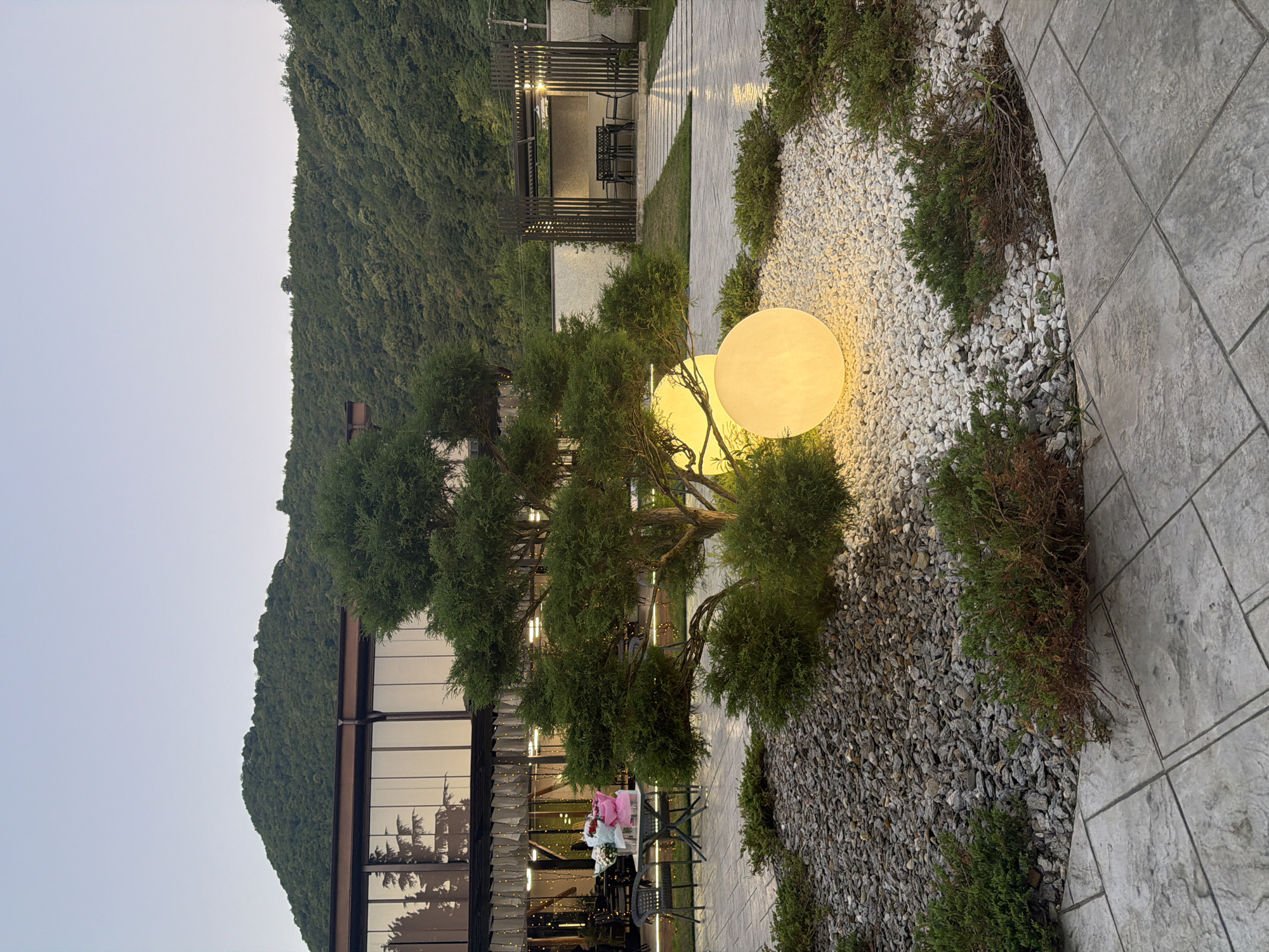 Evening gathering at a lit modern venue in Achadara, Abkhazia