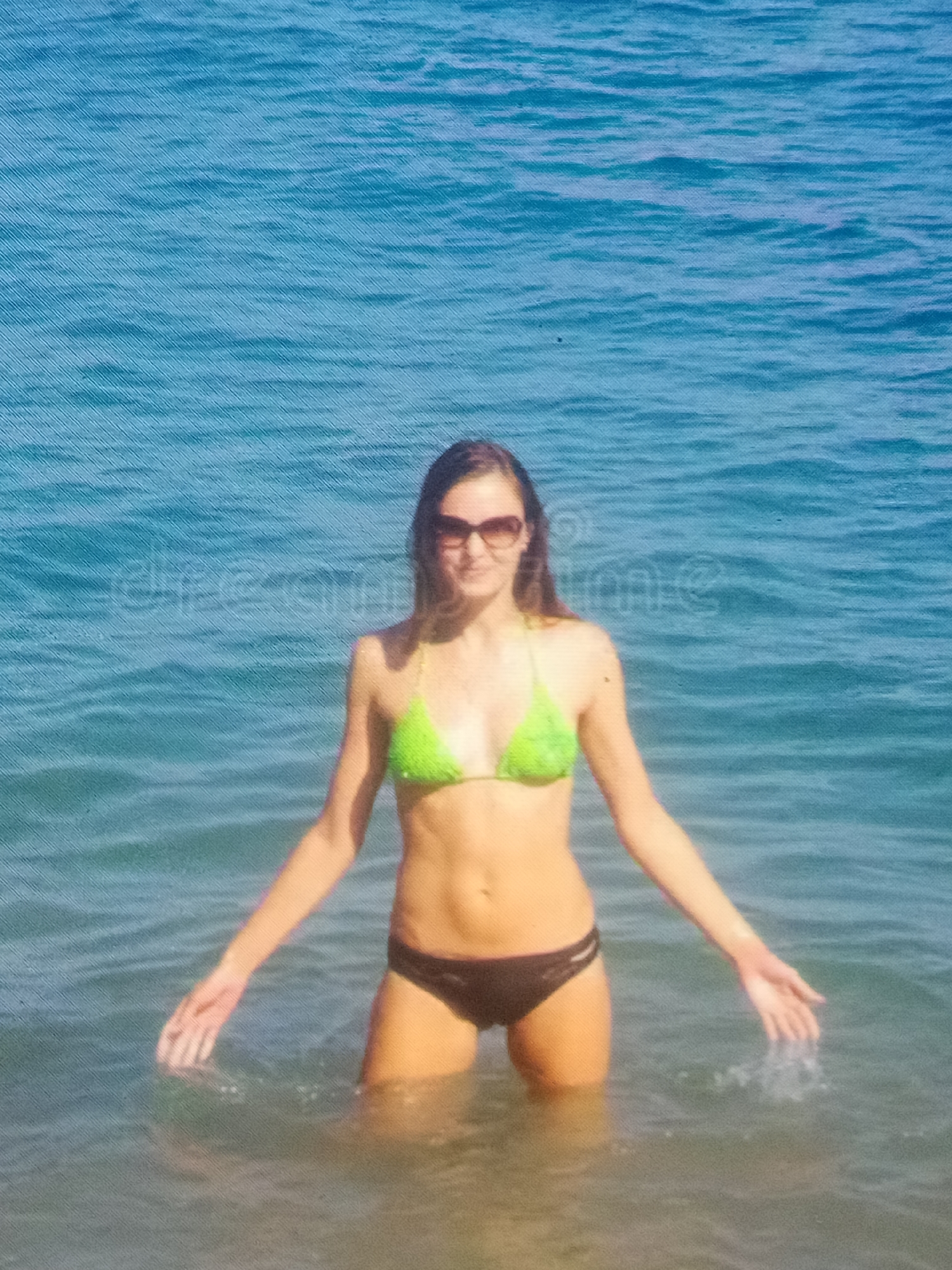 Beach scenes with women in swimwear captured globally
