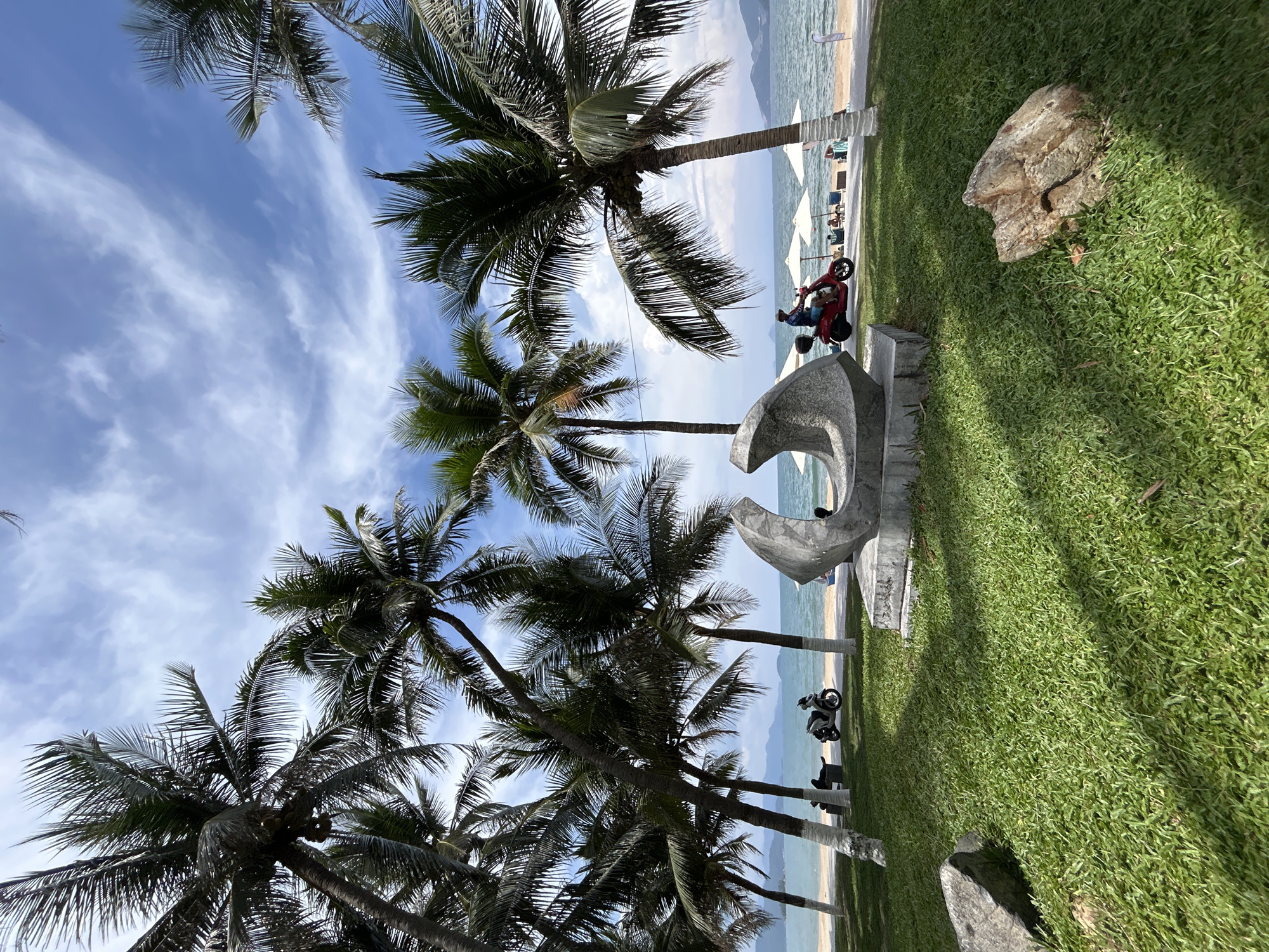 Early morning tourist moments captured around Nha Trang beach monuments