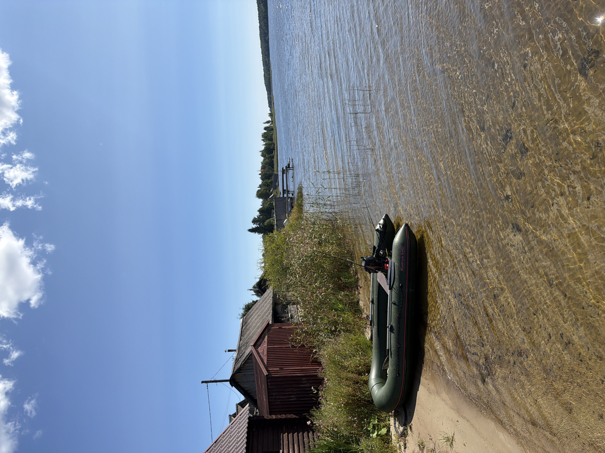 Quiet summer morning by a Russian lake — fishing, wildlife, and garden