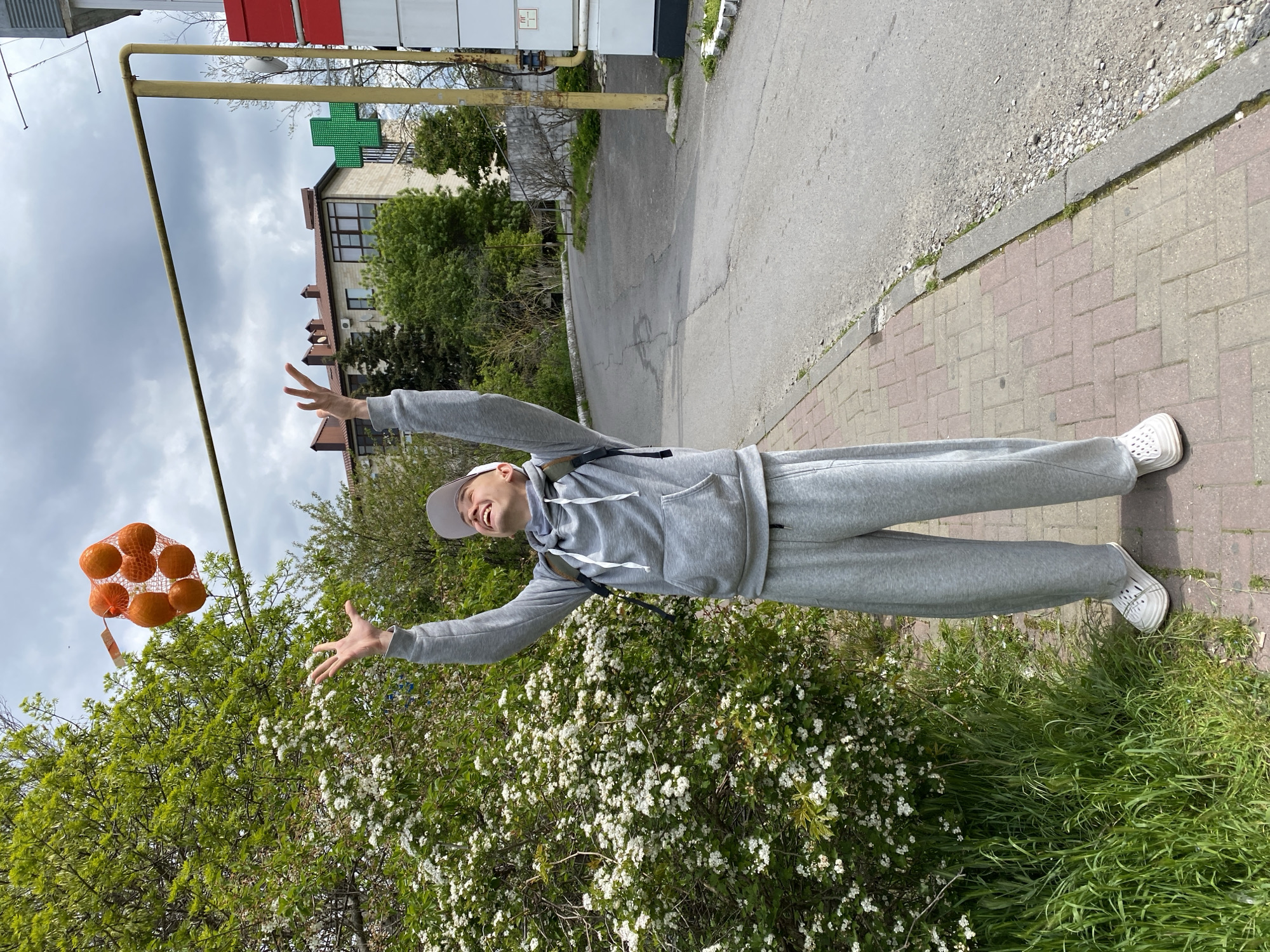 Person handles bag of oranges in Gelendzhik, Russia
