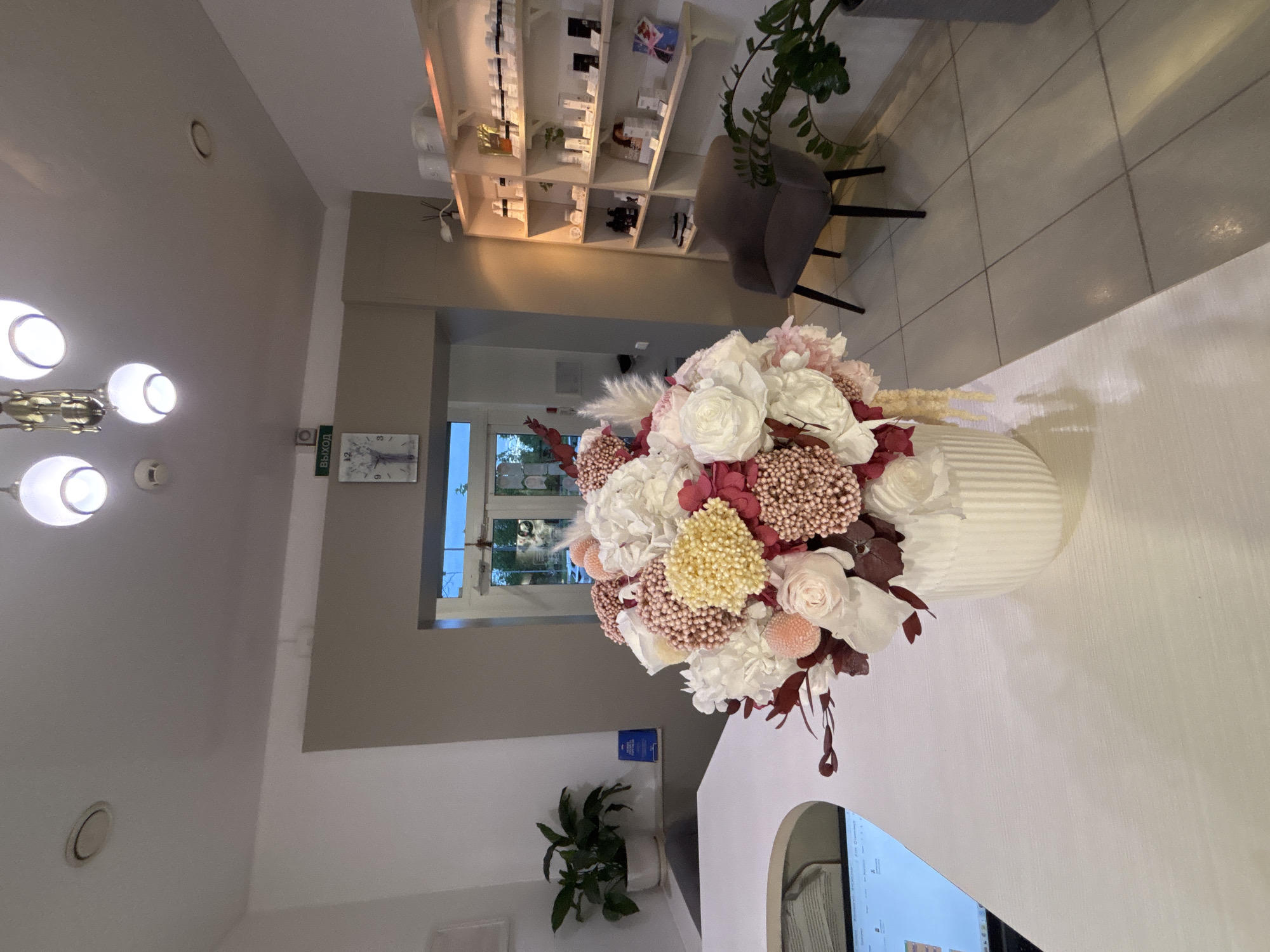 Floral arrangement observed in modern lobby reception area