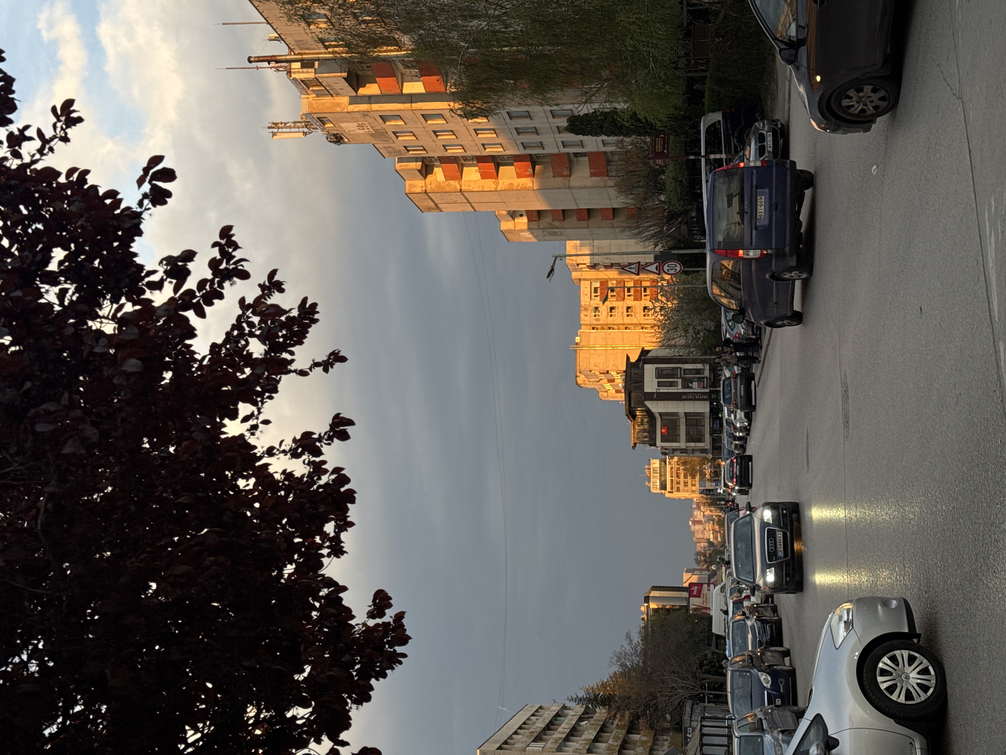 Golden hour illuminates Sofia streets in late afternoon scene