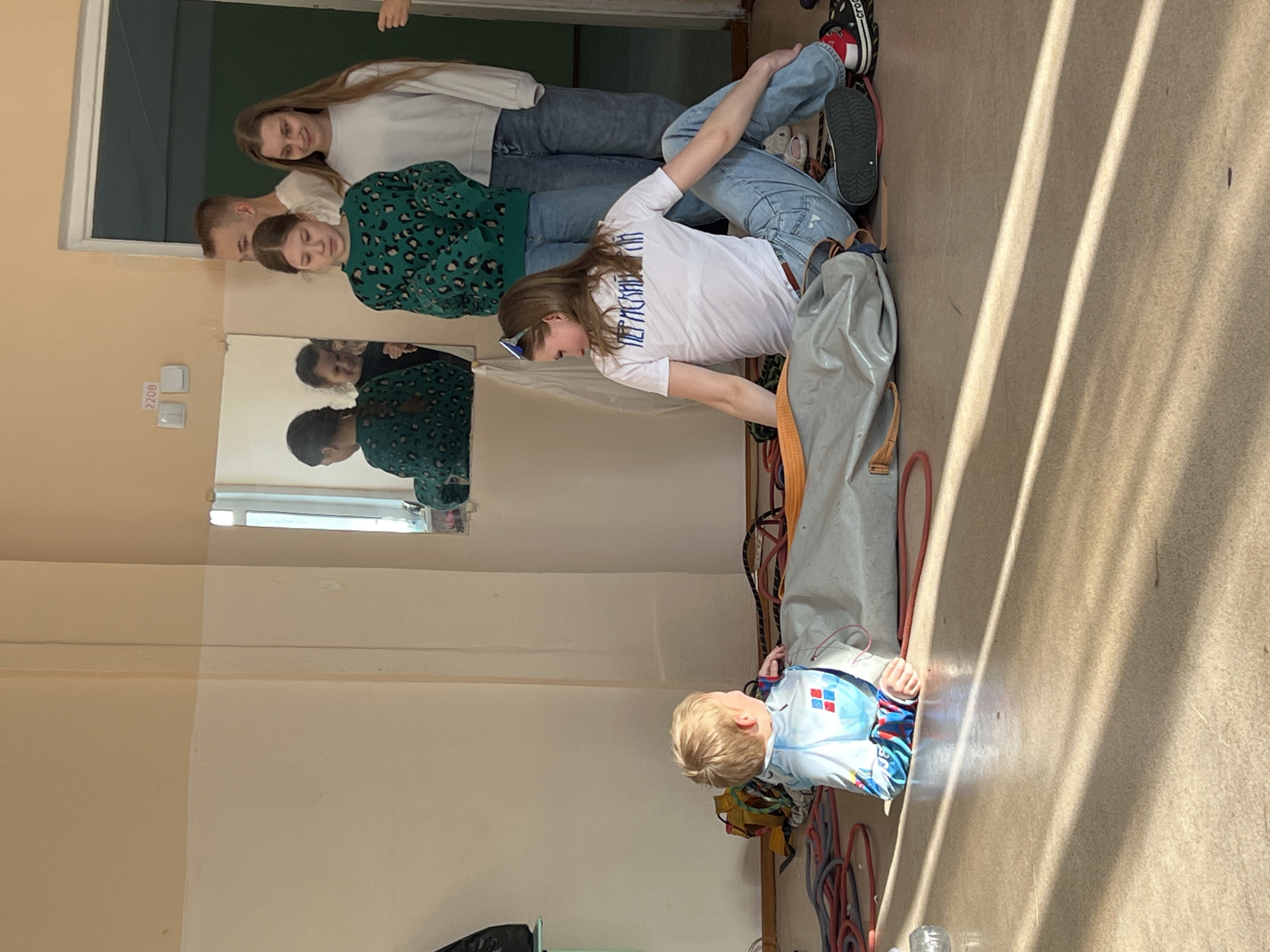 Youth climbing session documented at Berezniki gymnasium facility