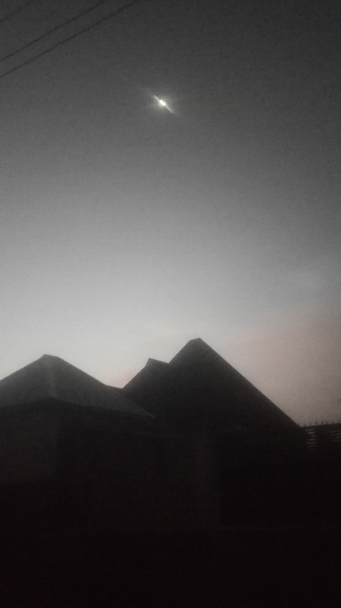 Dawn urban silhouettes photographed in grayscale