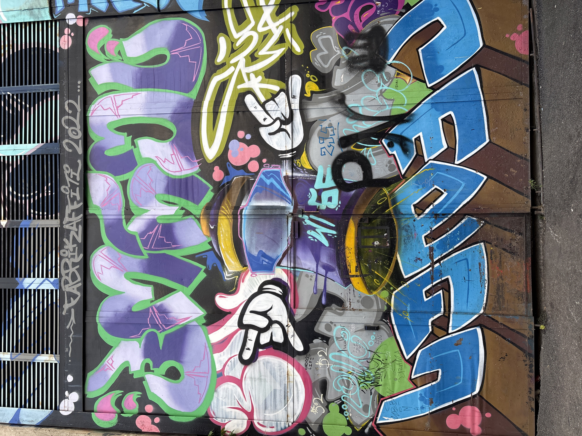 Street art tour through a graffiti-saturated urban neighborhood