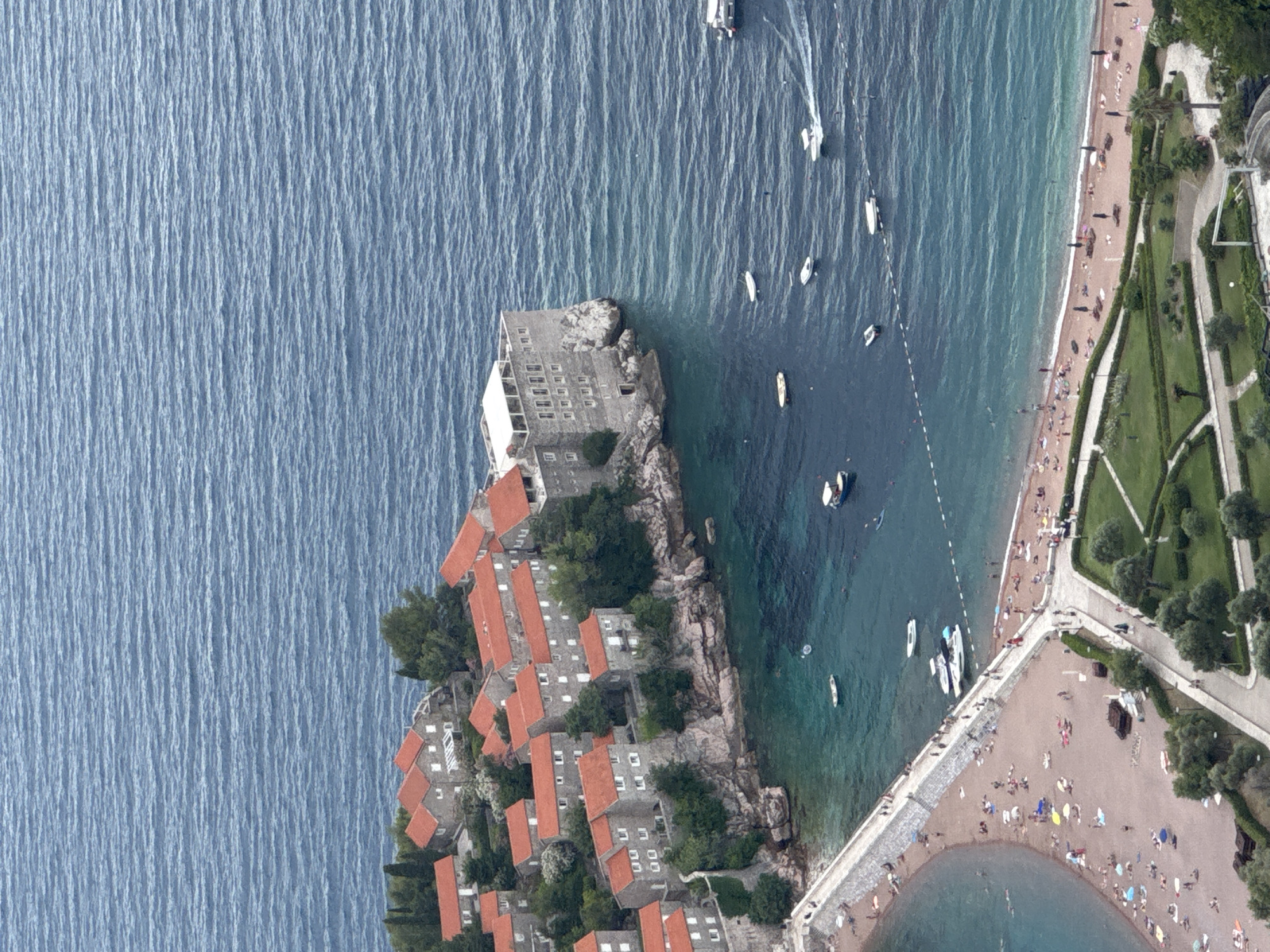 Sveti Stefan island and coastline, seen from above and ground