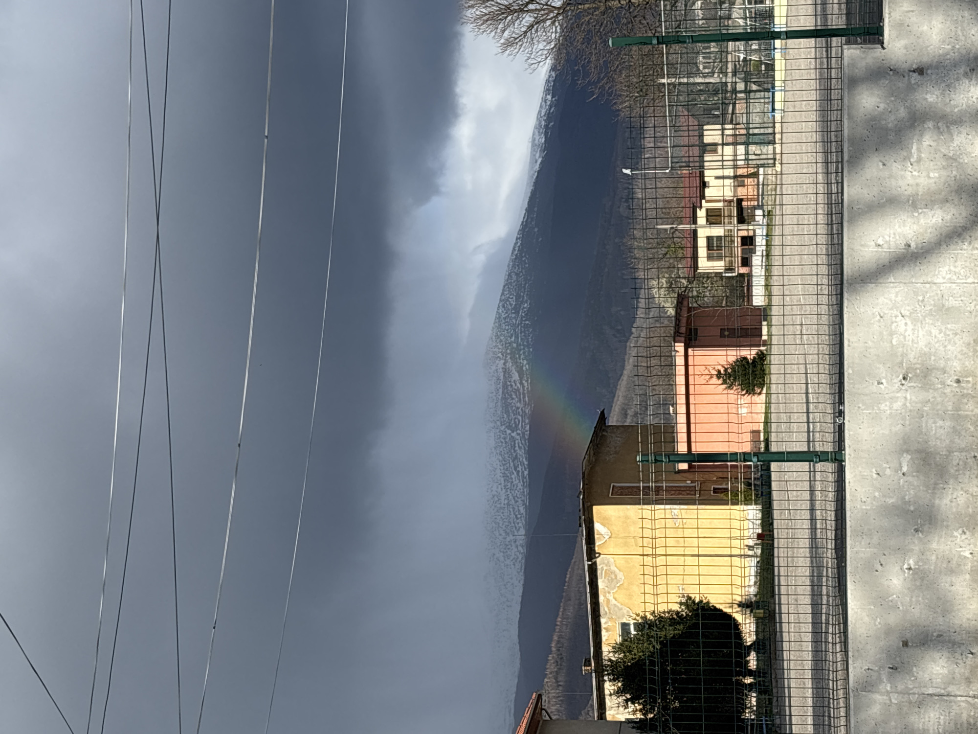 Rainbow appears over Zlatitsa, Bulgaria amid stormy skies