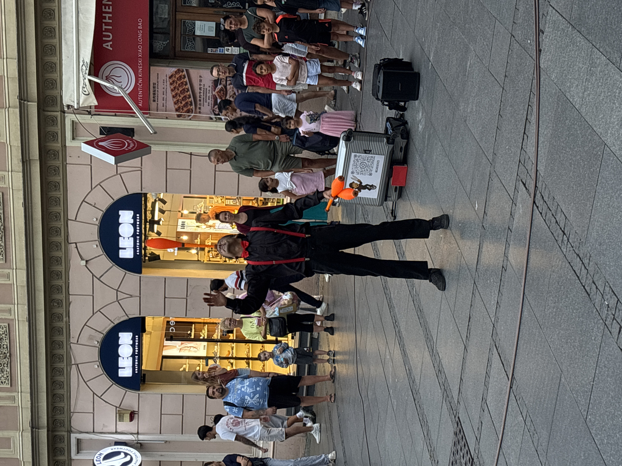 Unicyclist juggles and performs for crowds on Belgrade's main pedestrian street
