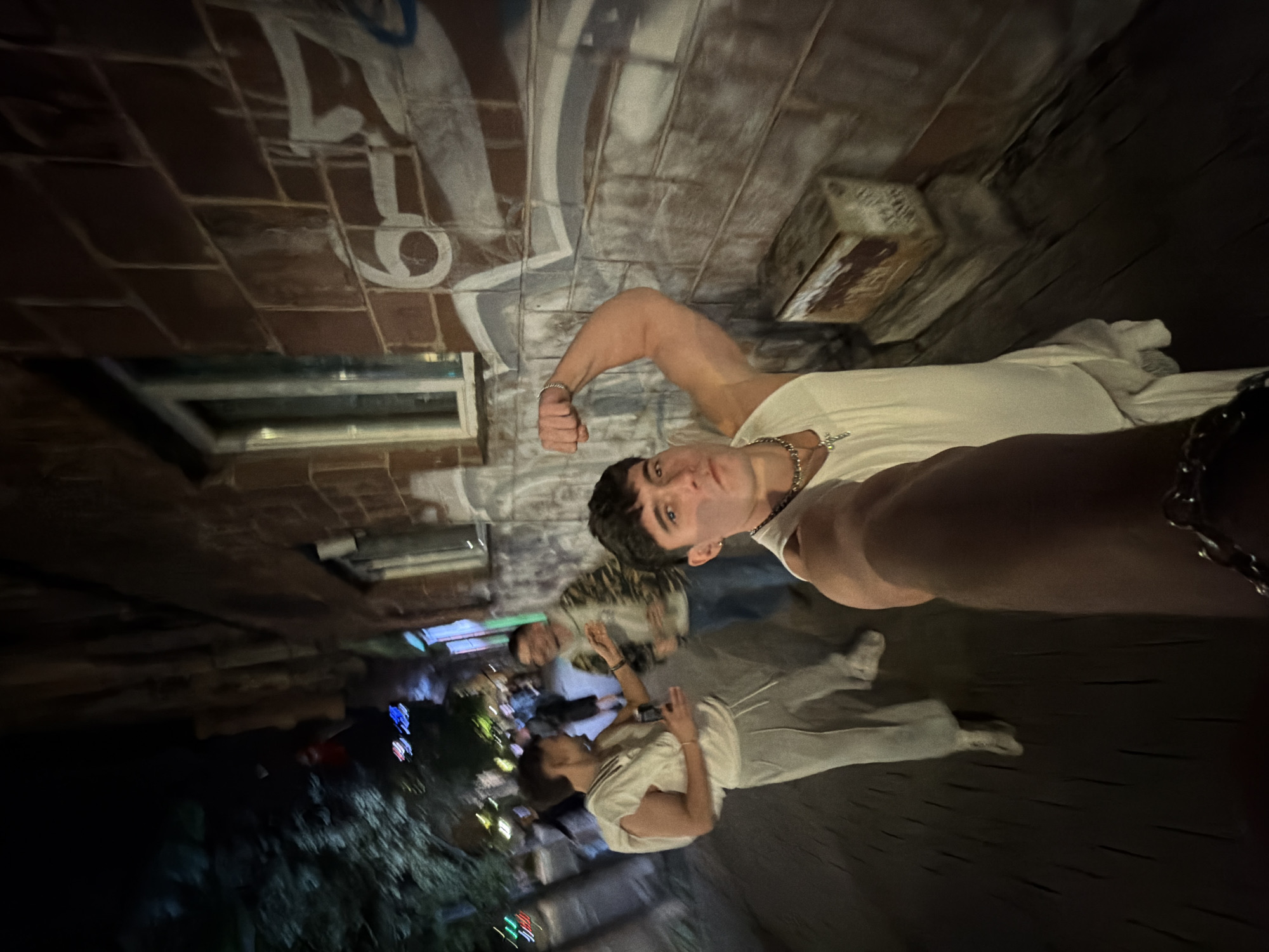 Young men pose for photos outside Sofia nightlife venue