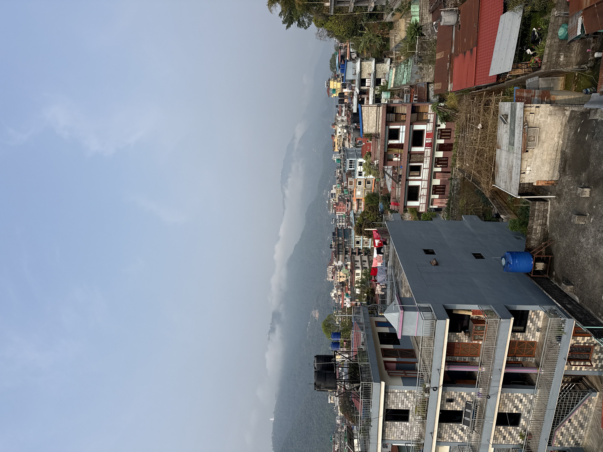 Hazy day documented across Pokhara's lakeside districts and streets