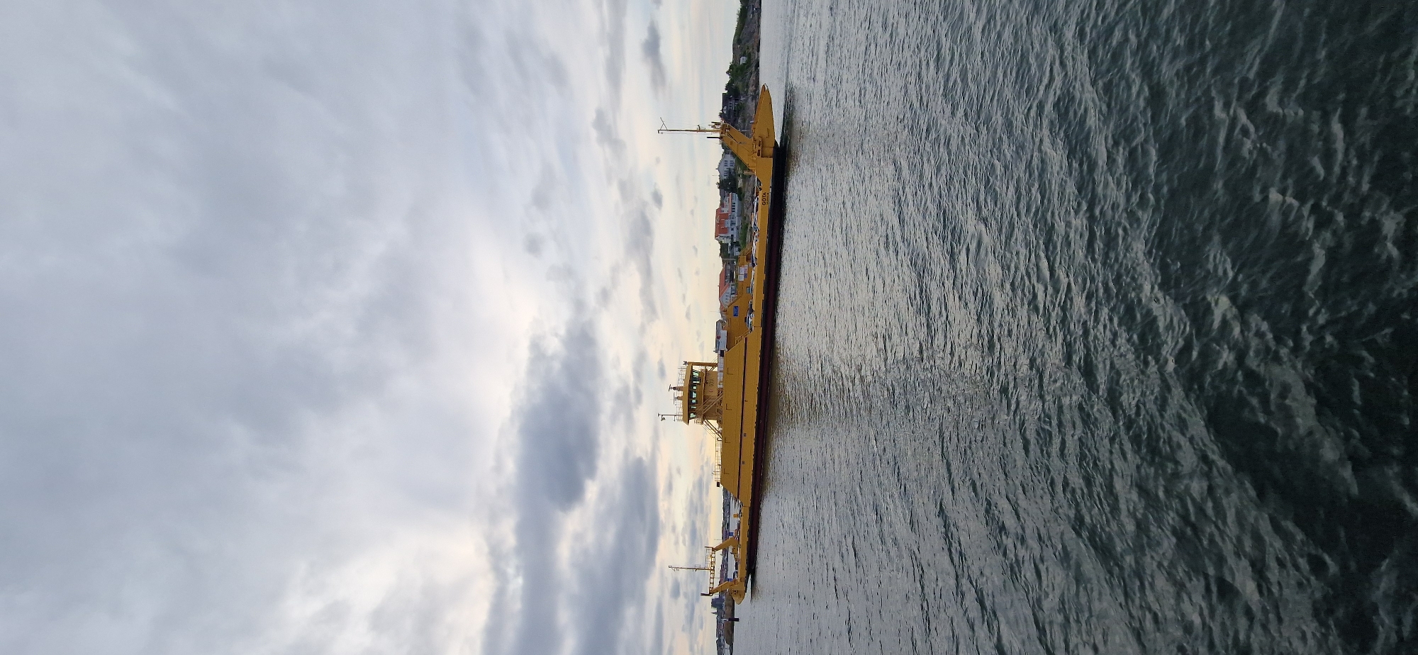 Yellow car ferry GOTA on the water near Öckerö, Sweden
