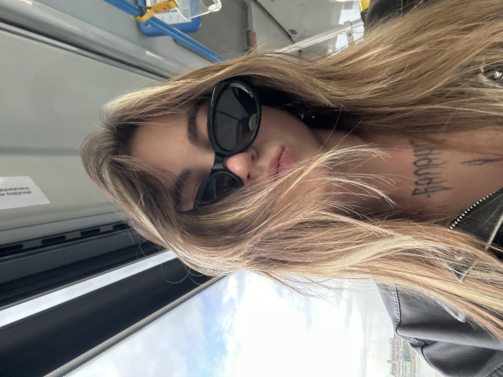 Selfie and portrait on Moscow transit, black leather jacket.