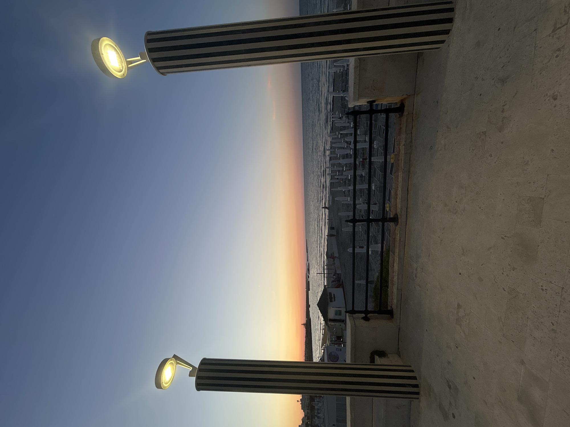 Sunset over San Foca's Adriatic beach, capped with dinner
