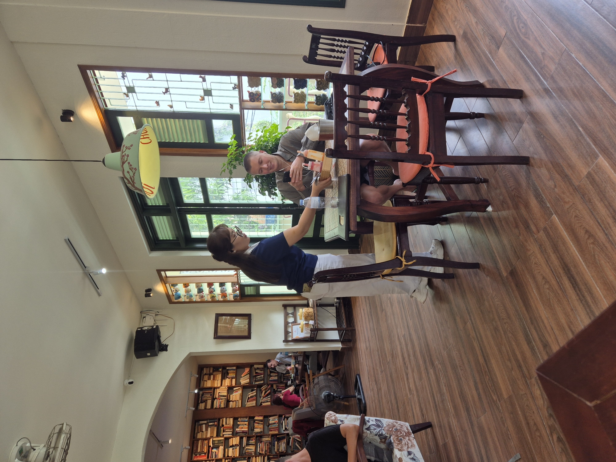 Lazy breakfast morning at a Da Nang cafe with food and coloring books