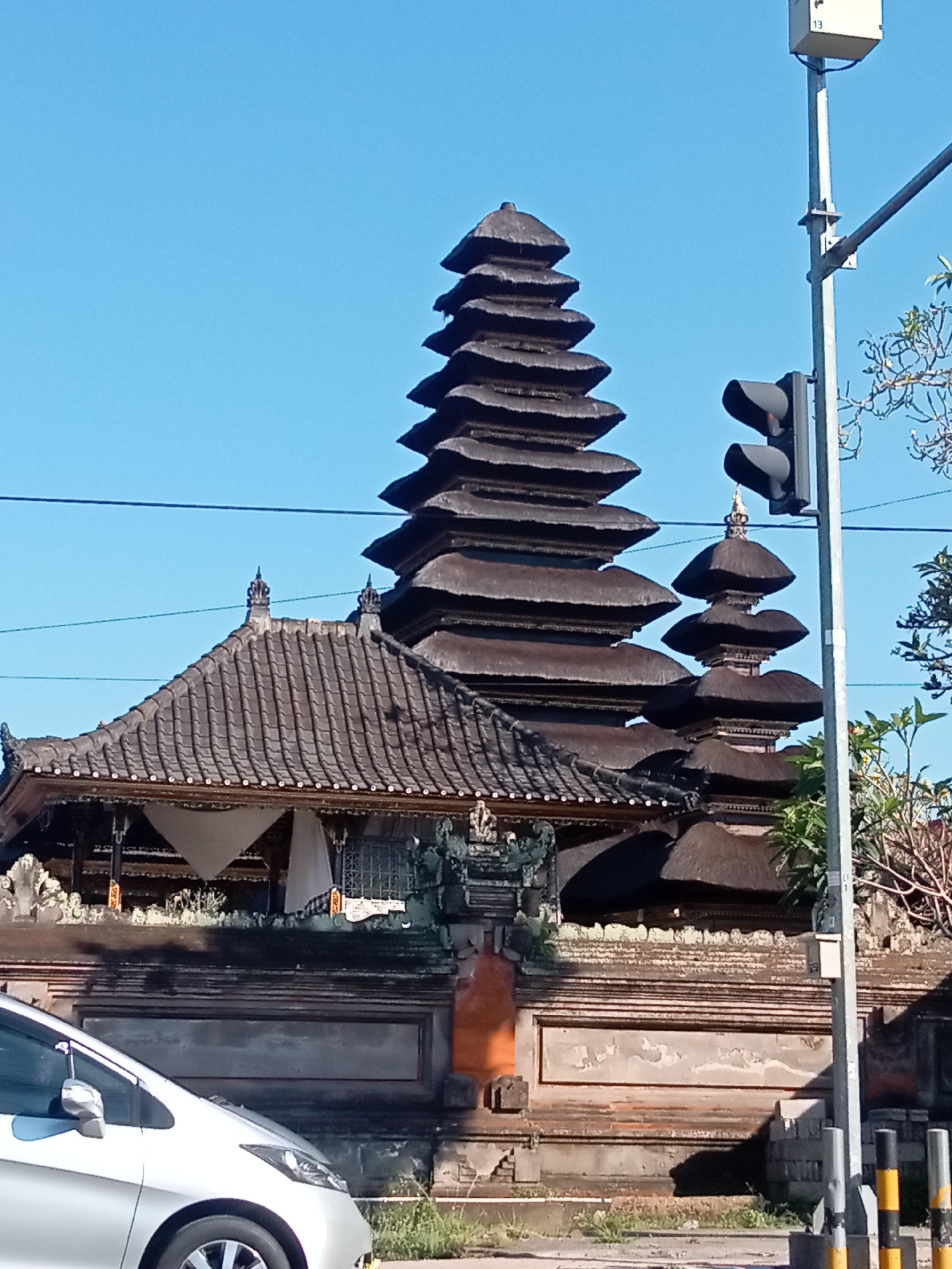 Balinese temple grounds and ceremonial street decorations up close