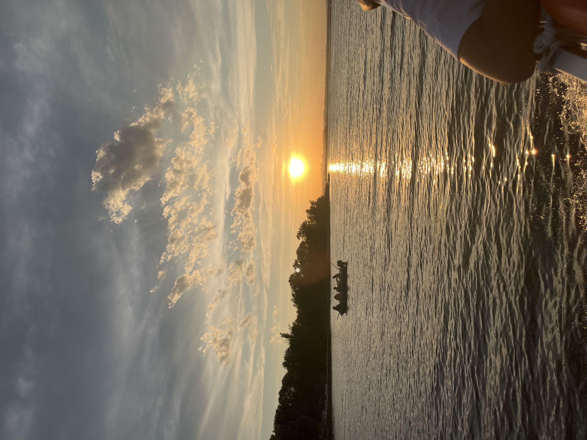Boat trip on a Russian river at sunset