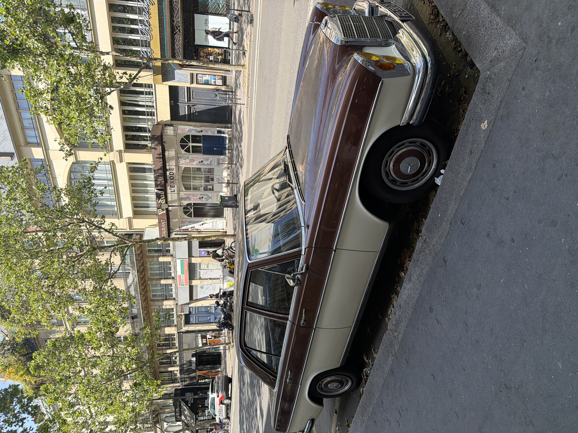 Two-tone Mercedes parked on a Paris street