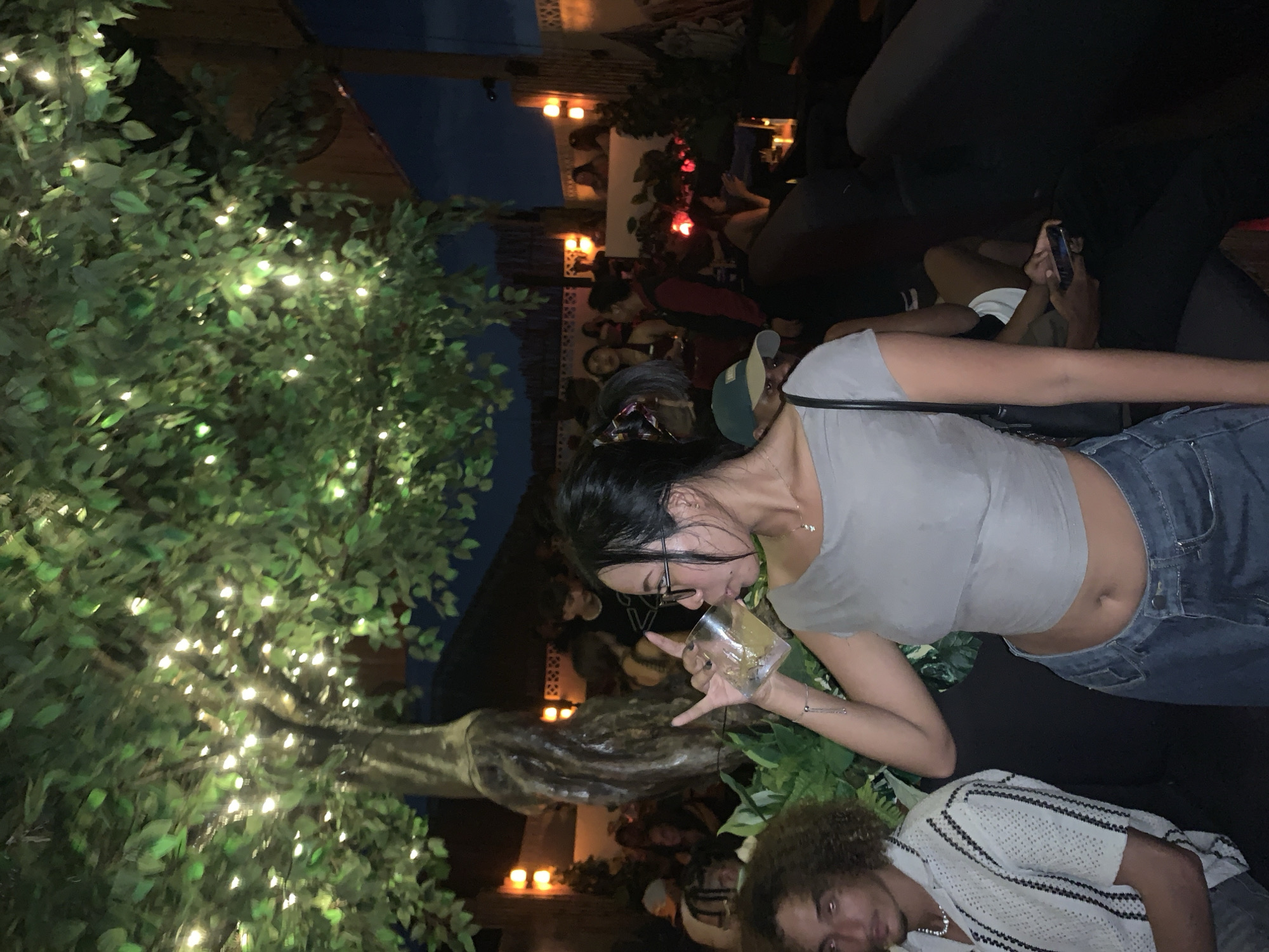 Evening social gathering at outdoor North Kuta bar venue