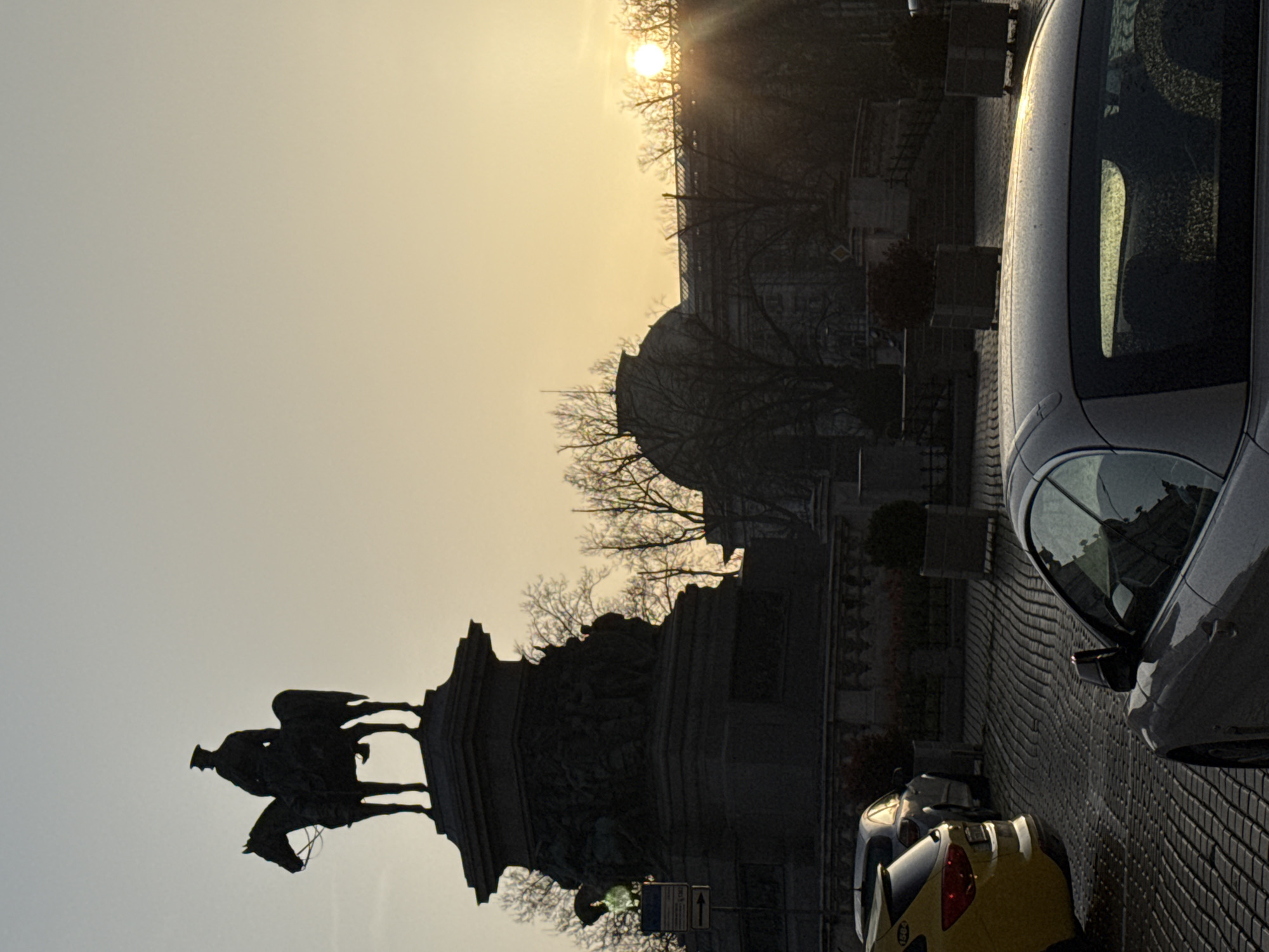 Urban sunrise/sunset scene captured in portrait mode
