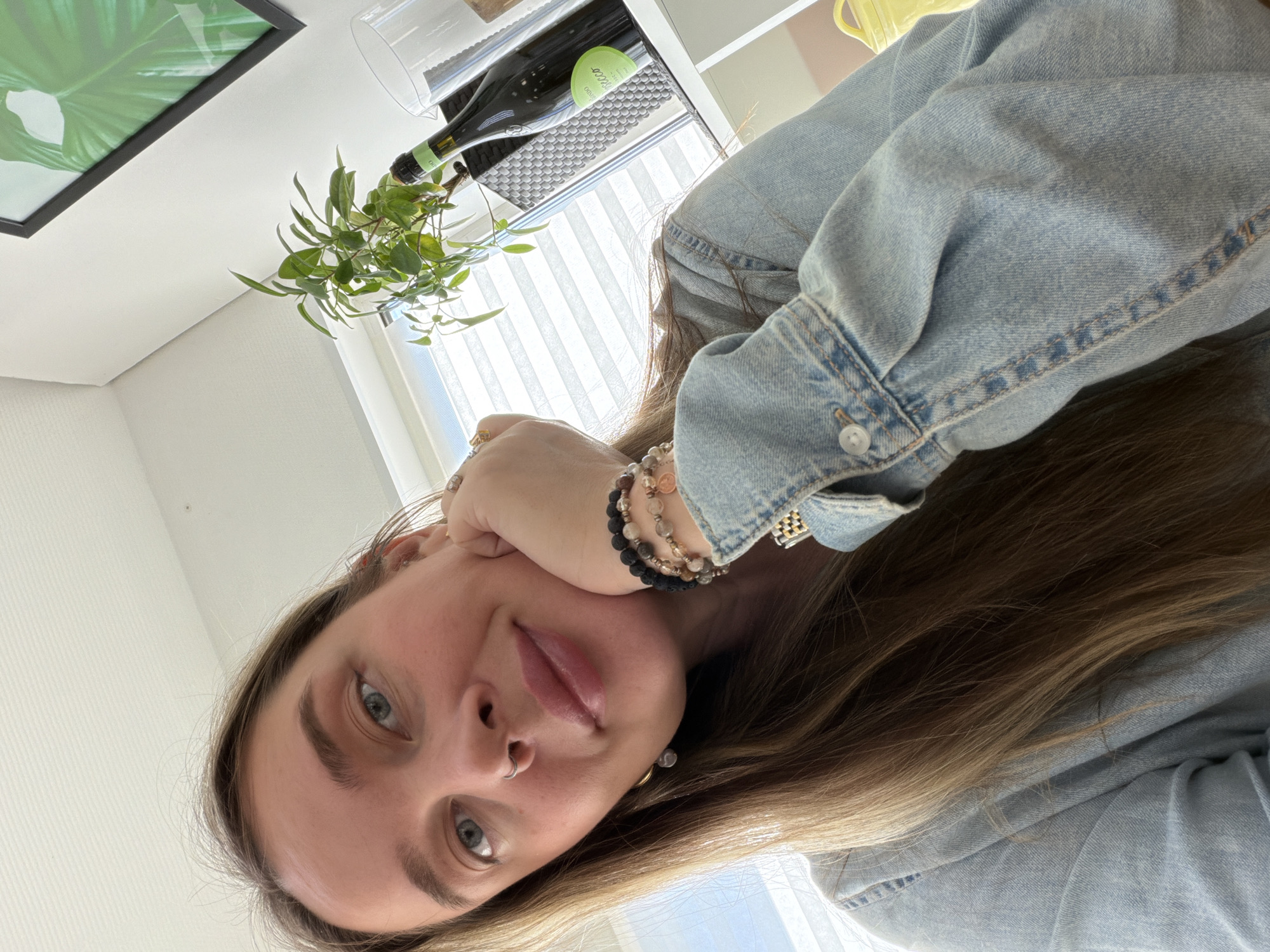 Woman takes morning selfies in different outfits in Chaikovsky