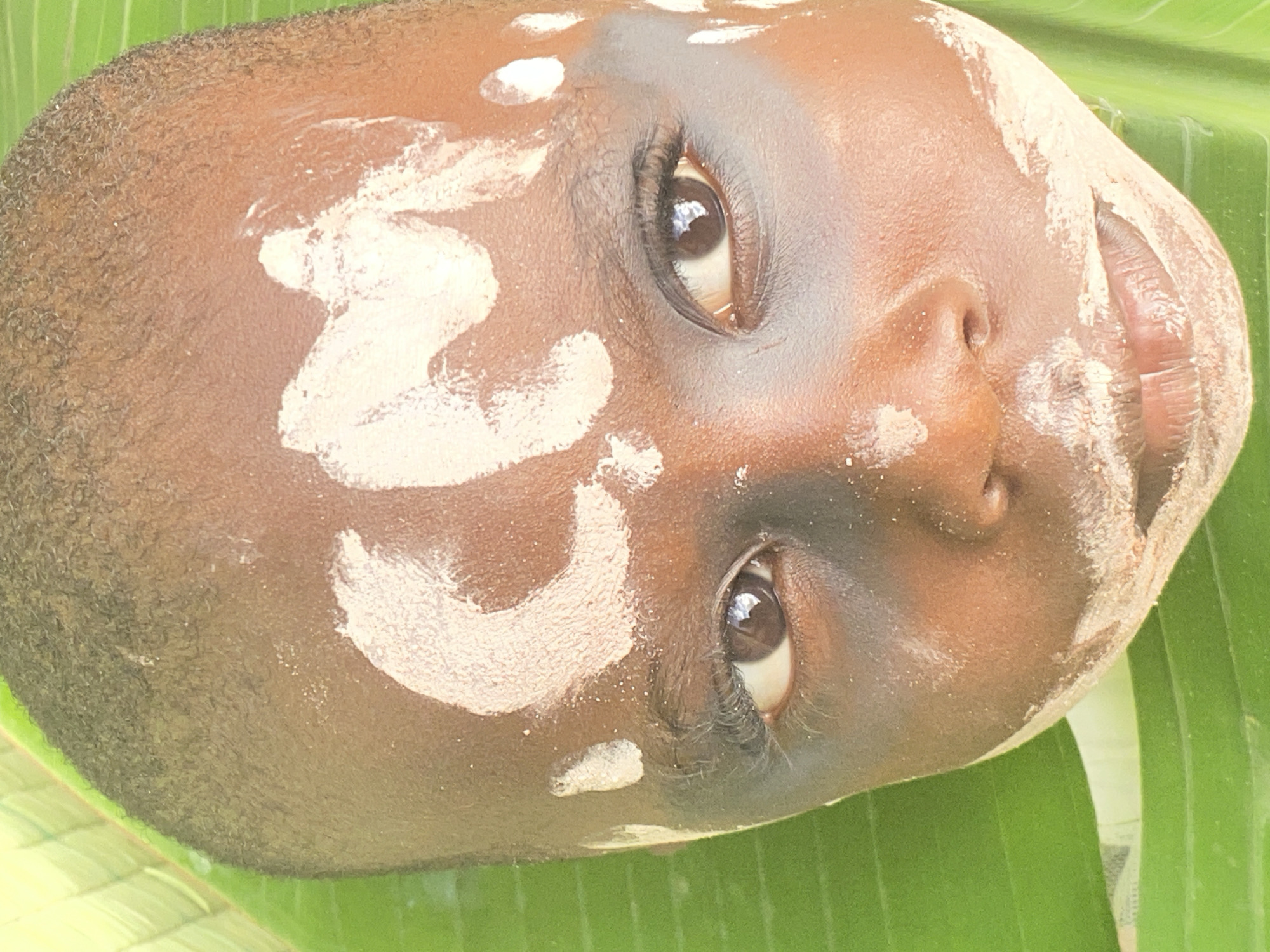 Traditional face painting documented in Achara, Nigeria