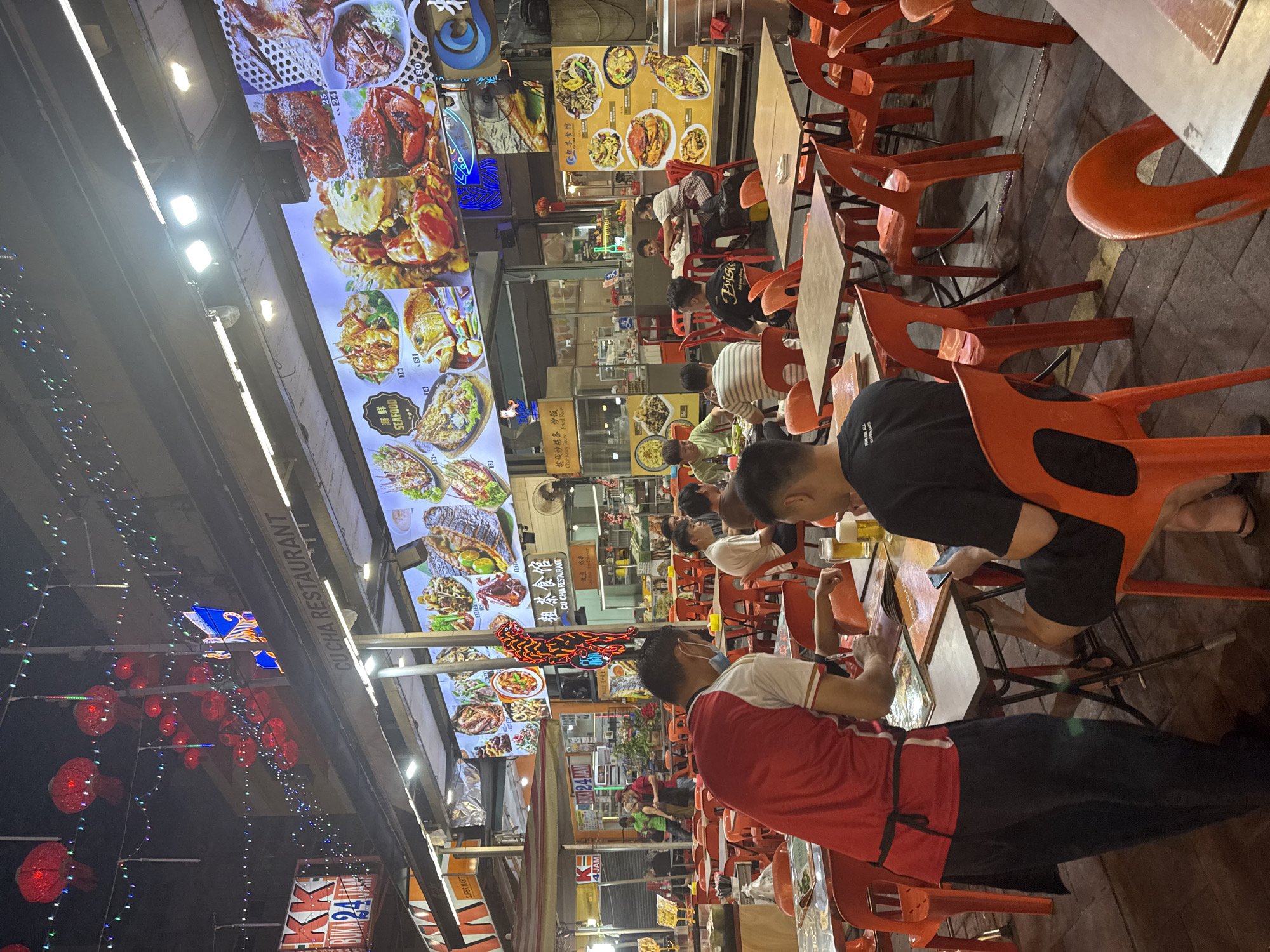 Evening dining scene documented at Kuala Lumpur night market