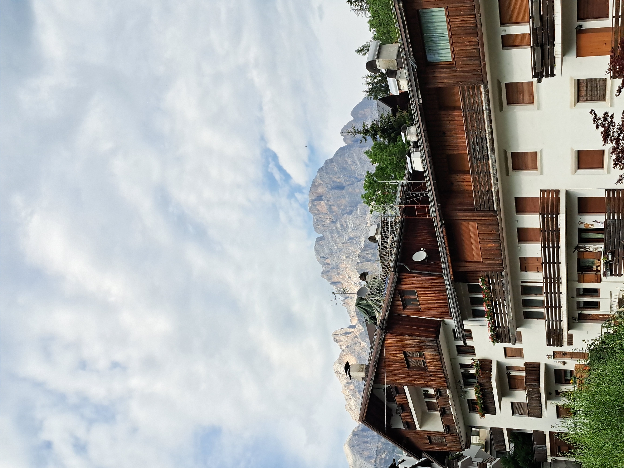 Alpine town and turquoise lake, midday exploration
