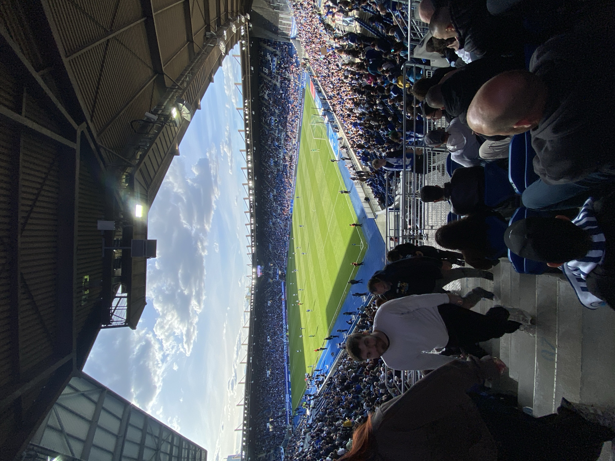 Soccer match underway at Strasbourg stadium with crowds present