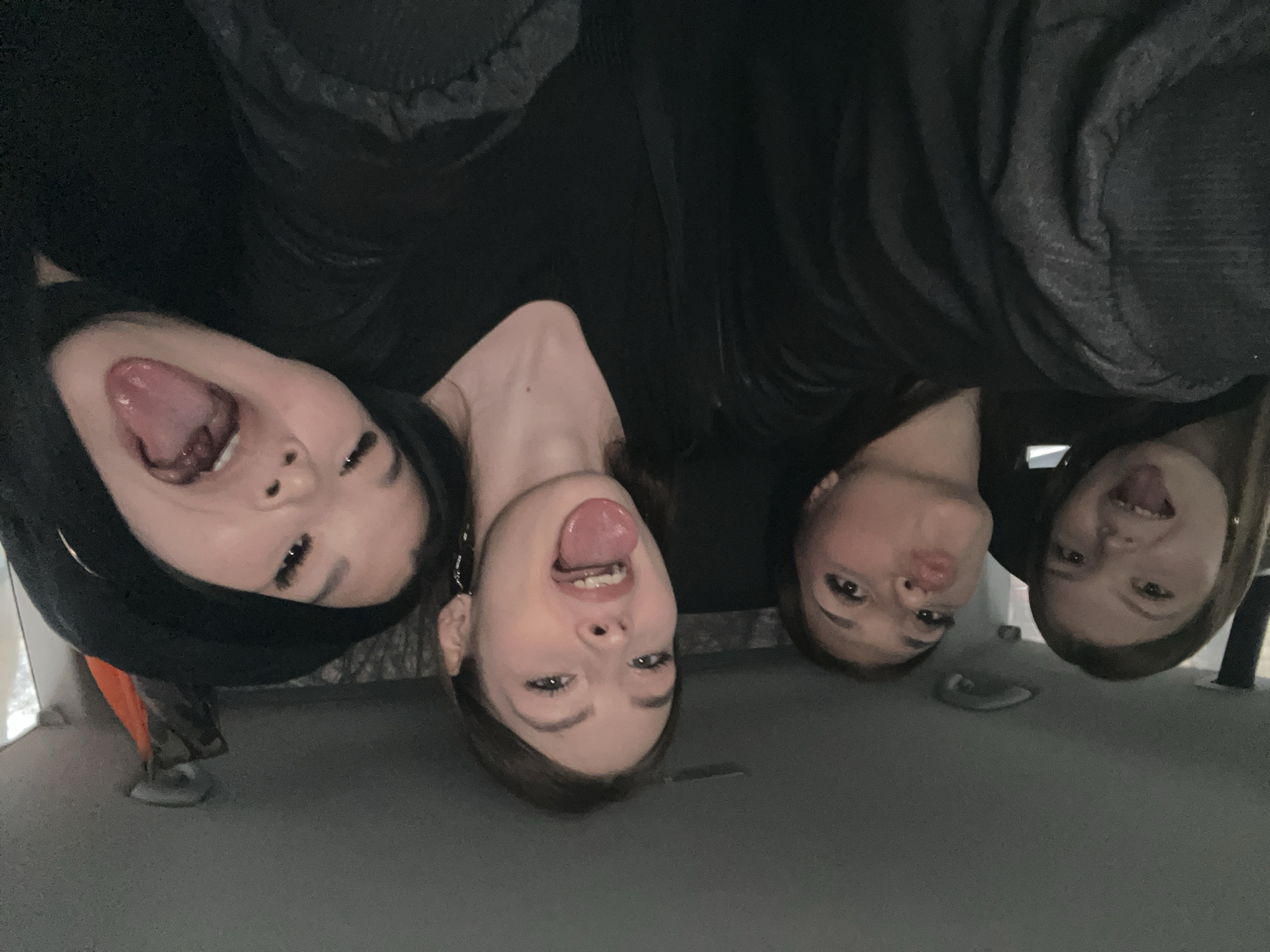 Four women pose for playful group photo in Saint Petersburg