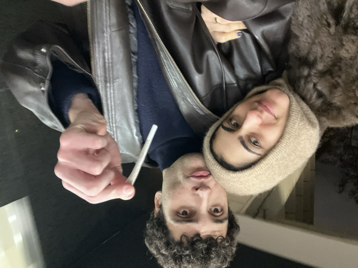 Couple documents elevator selfies and food purchases in Madrid