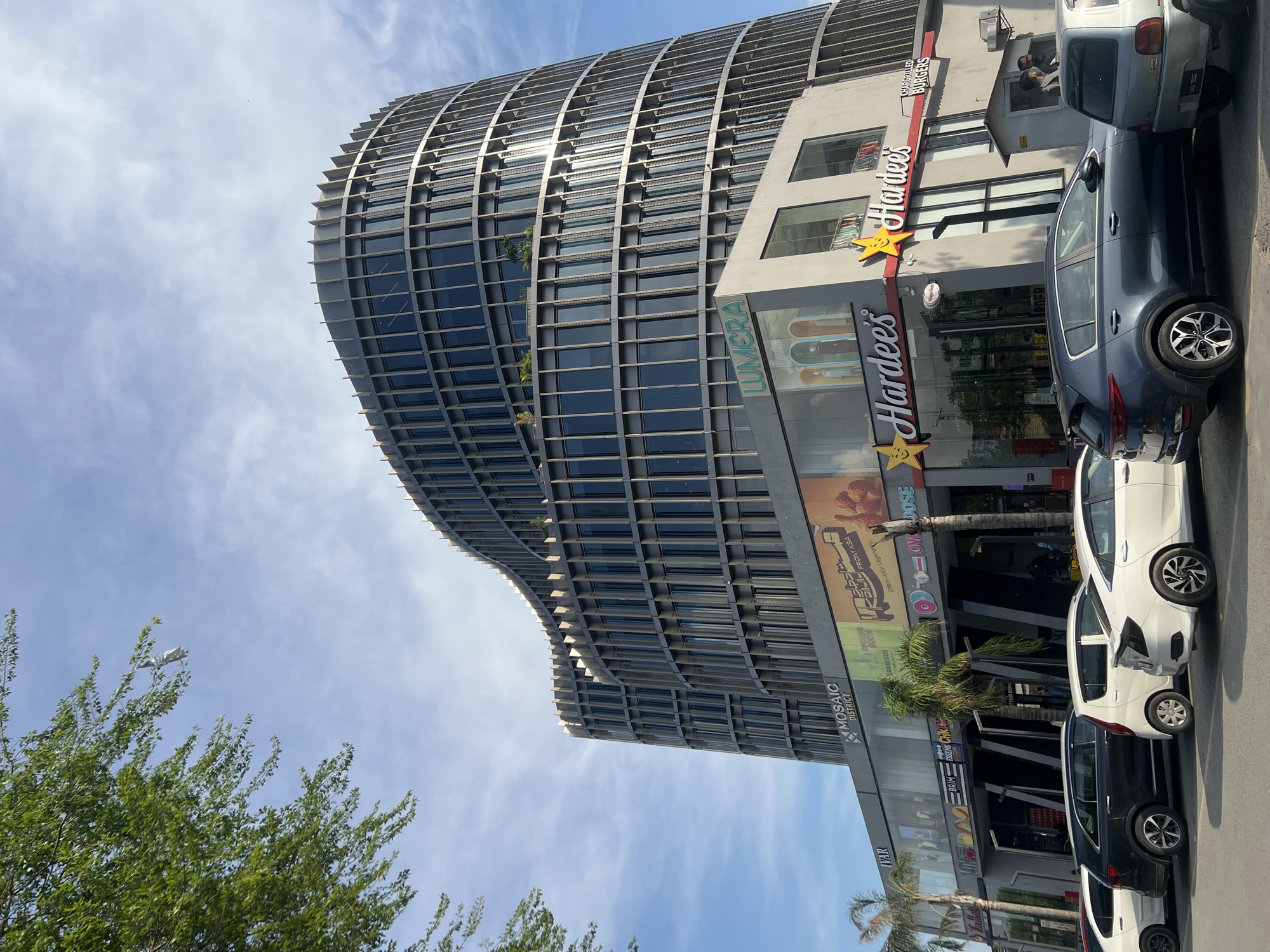Modern curved building documented in Islamabad on sunny day