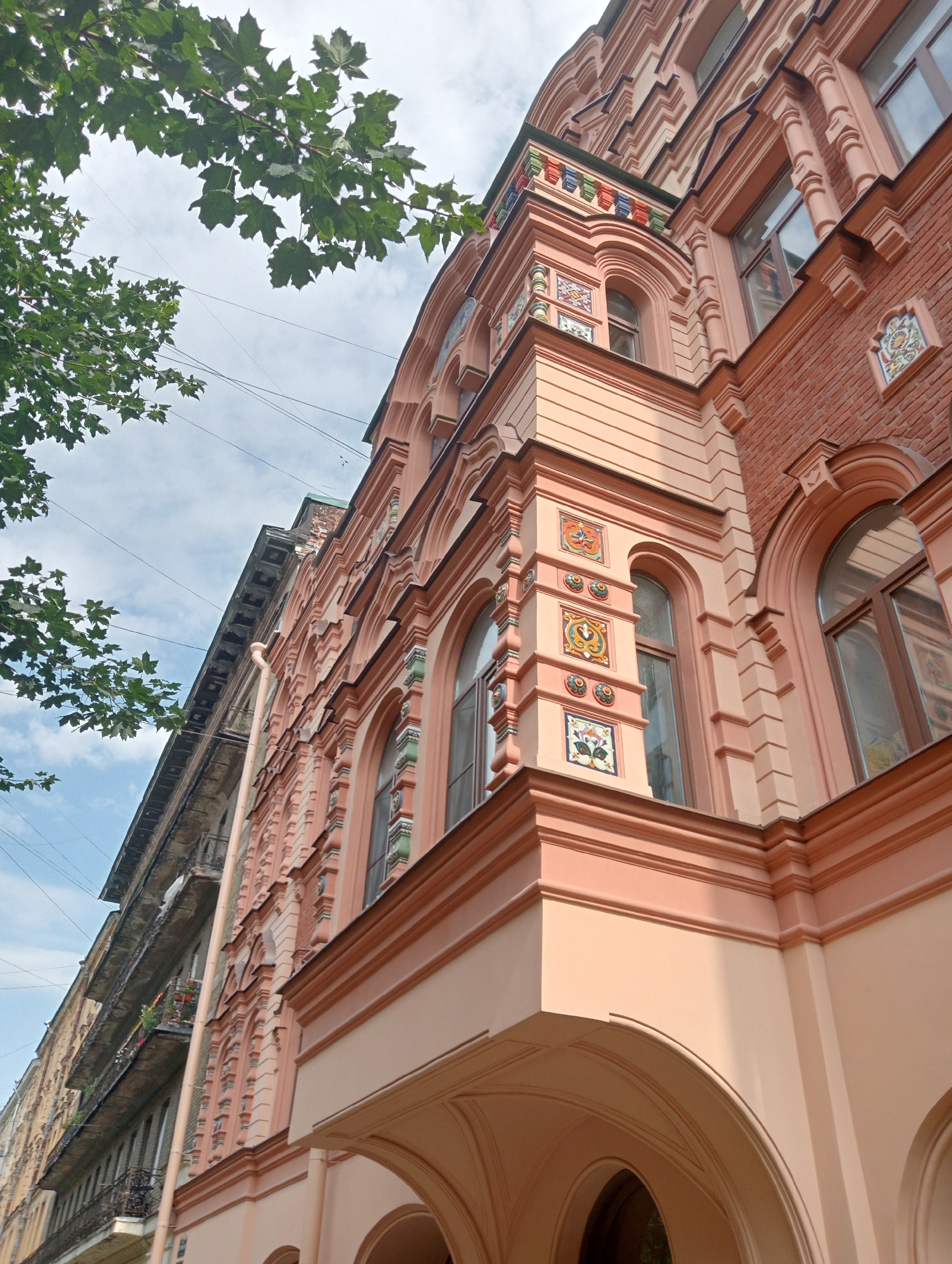 Ornate Saint Petersburg facade and courtyard, mid-summer