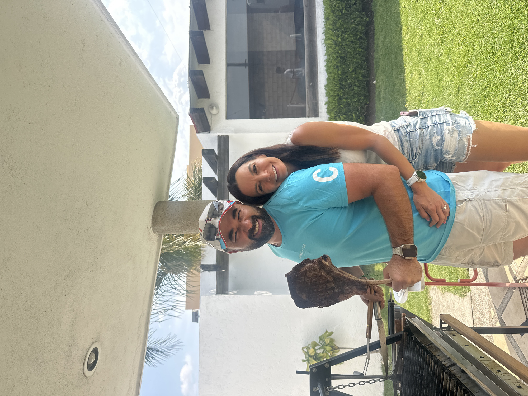 Couple grills meat outdoors in Cháhuac, Mexico