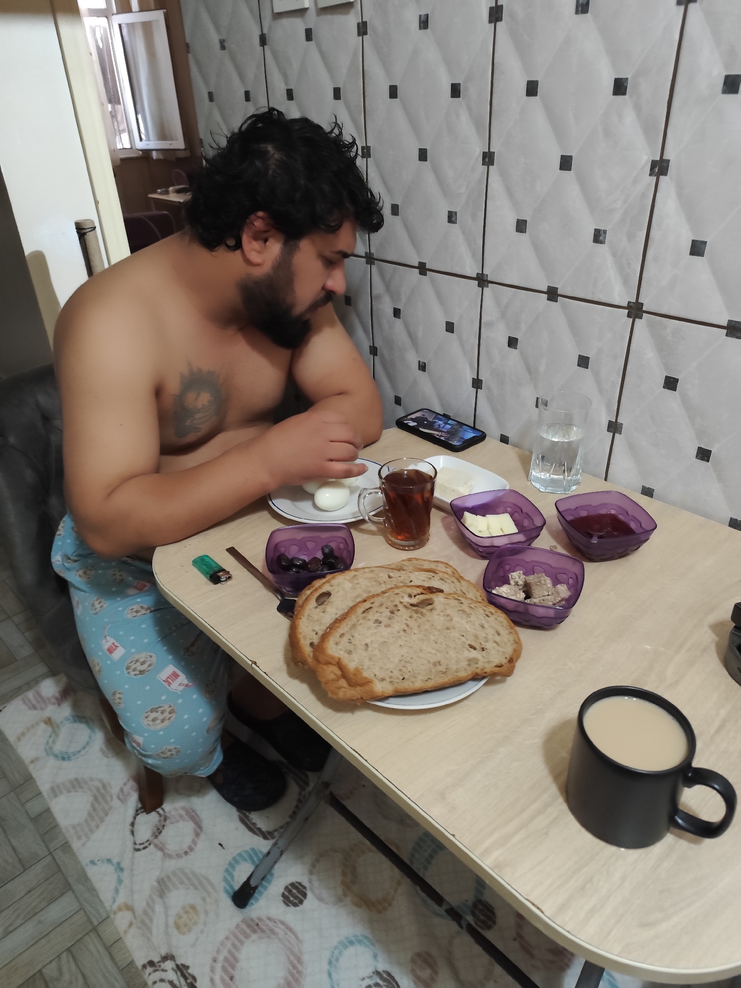 Turkish breakfast shared with curious Scottish Fold cat in Sarıyer