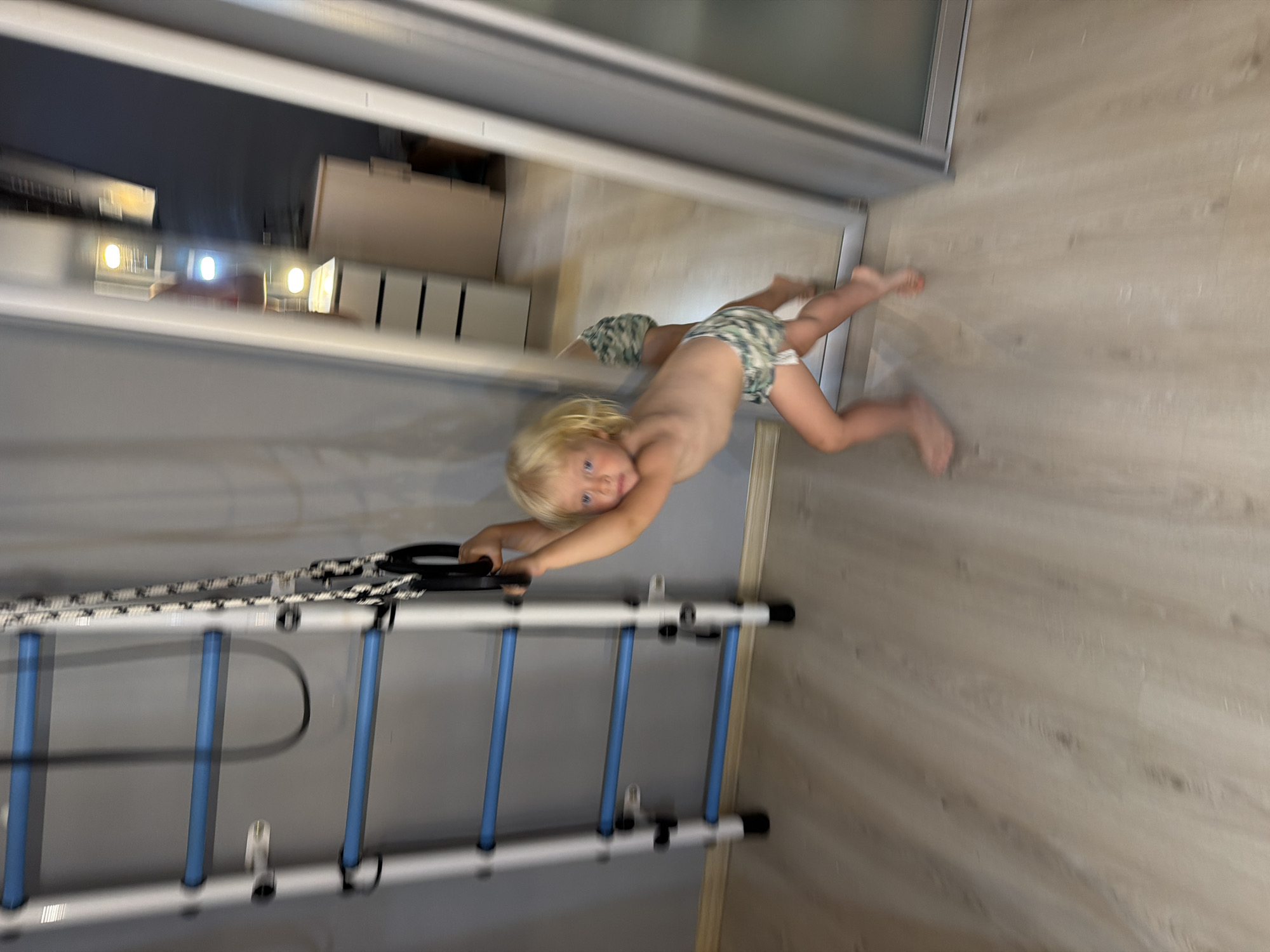 Toddler on gymnastics rings, hydrangea bouquet selfies, Sochi