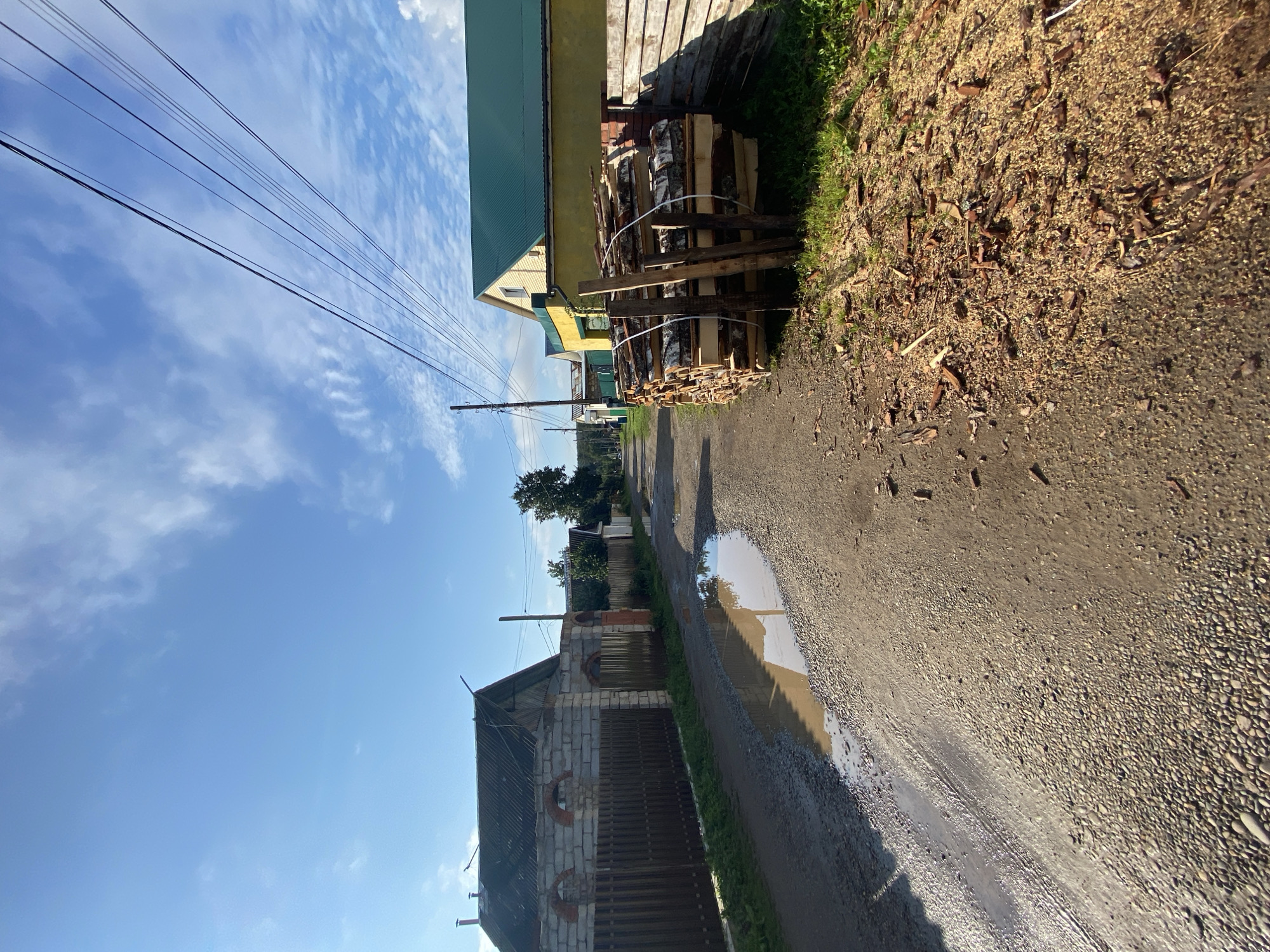 Rainy day stop on a muddy rural road in Chaikovsky