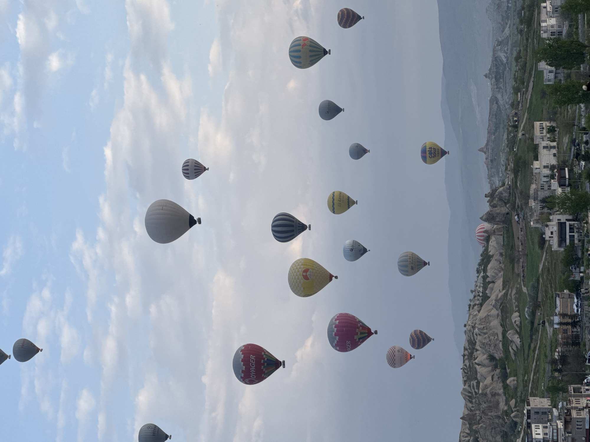 Hot air balloons drift over Göreme's rock formations
