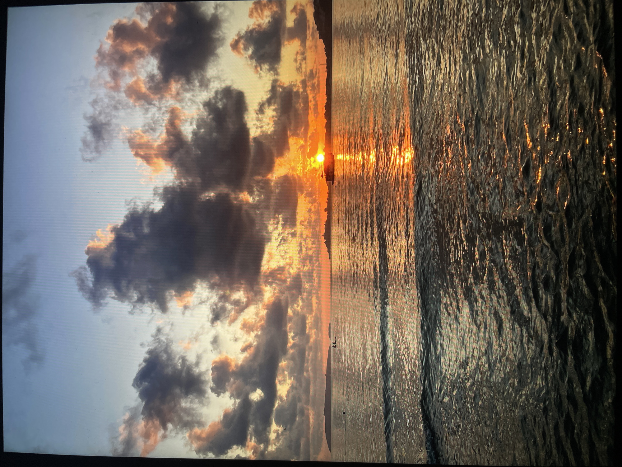 Evening memories captured: sunset coast, candlelit room, cat's eye